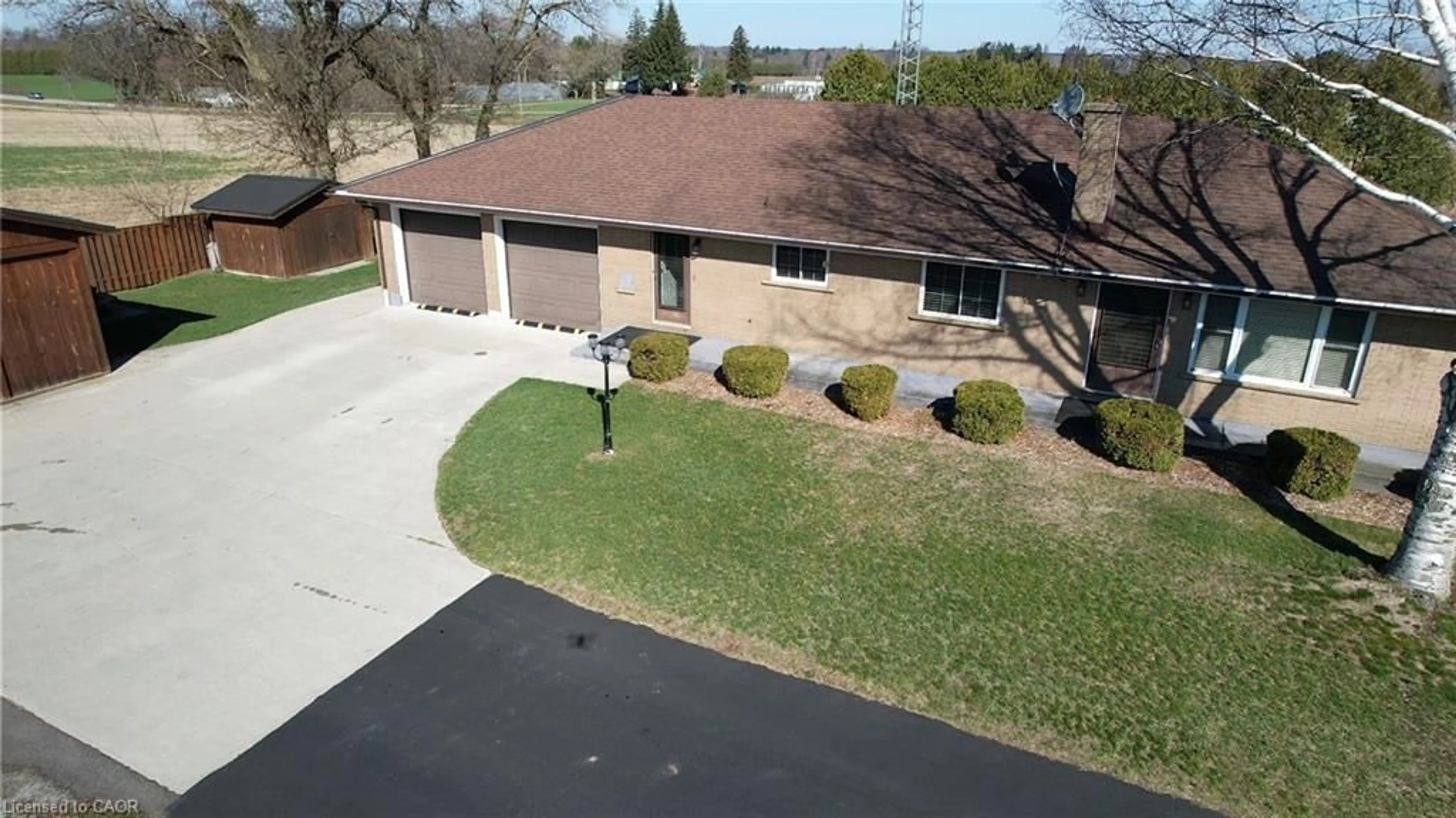 A pic from outside/outdoor area/front of a property/back of a property/a pic from drone, street for 1777 Forestry Farm Rd, Simcoe Ontario N3Y 4K5