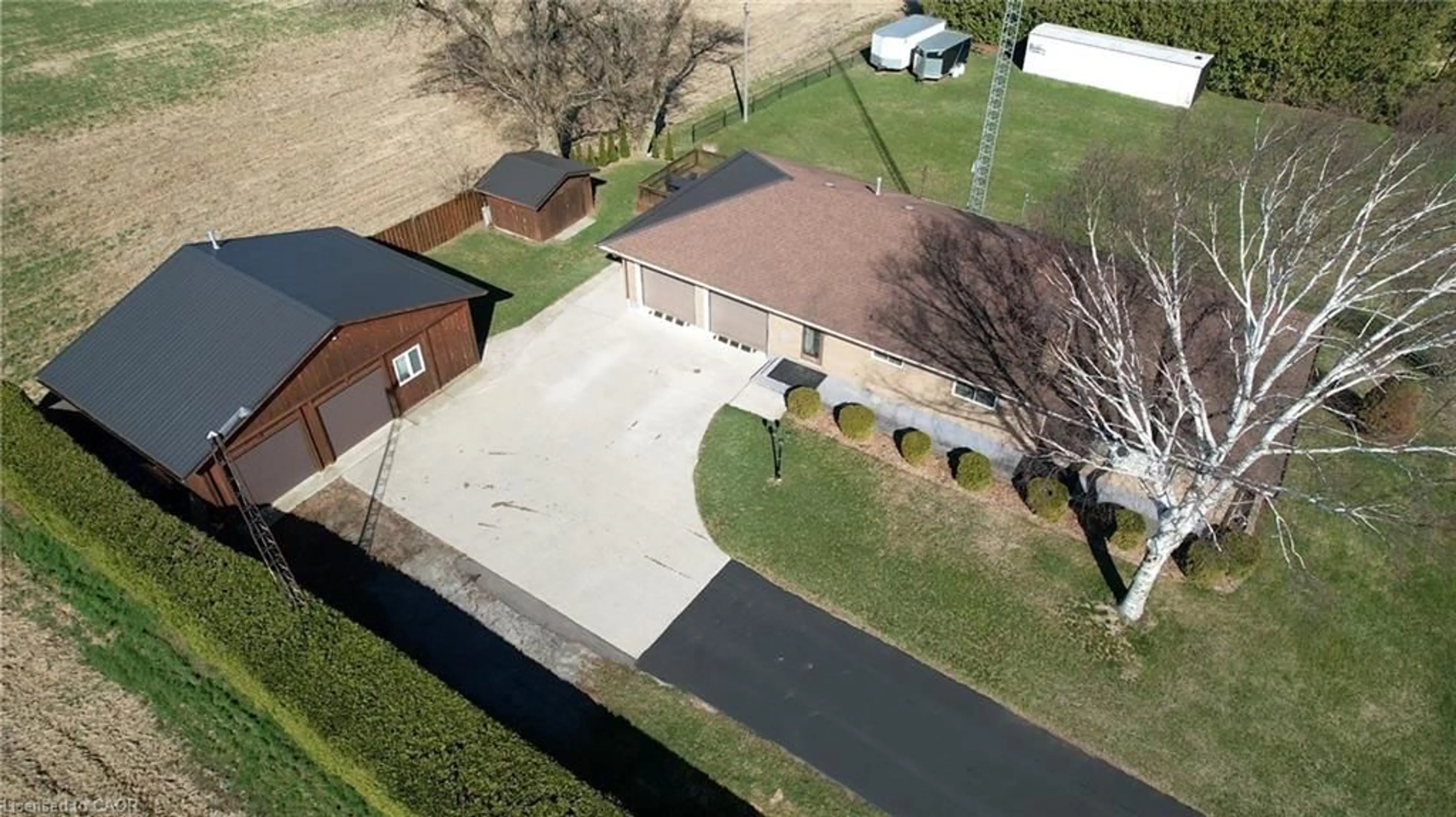A pic from outside/outdoor area/front of a property/back of a property/a pic from drone, street for 1777 Forestry Farm Rd, Simcoe Ontario N3Y 4K5