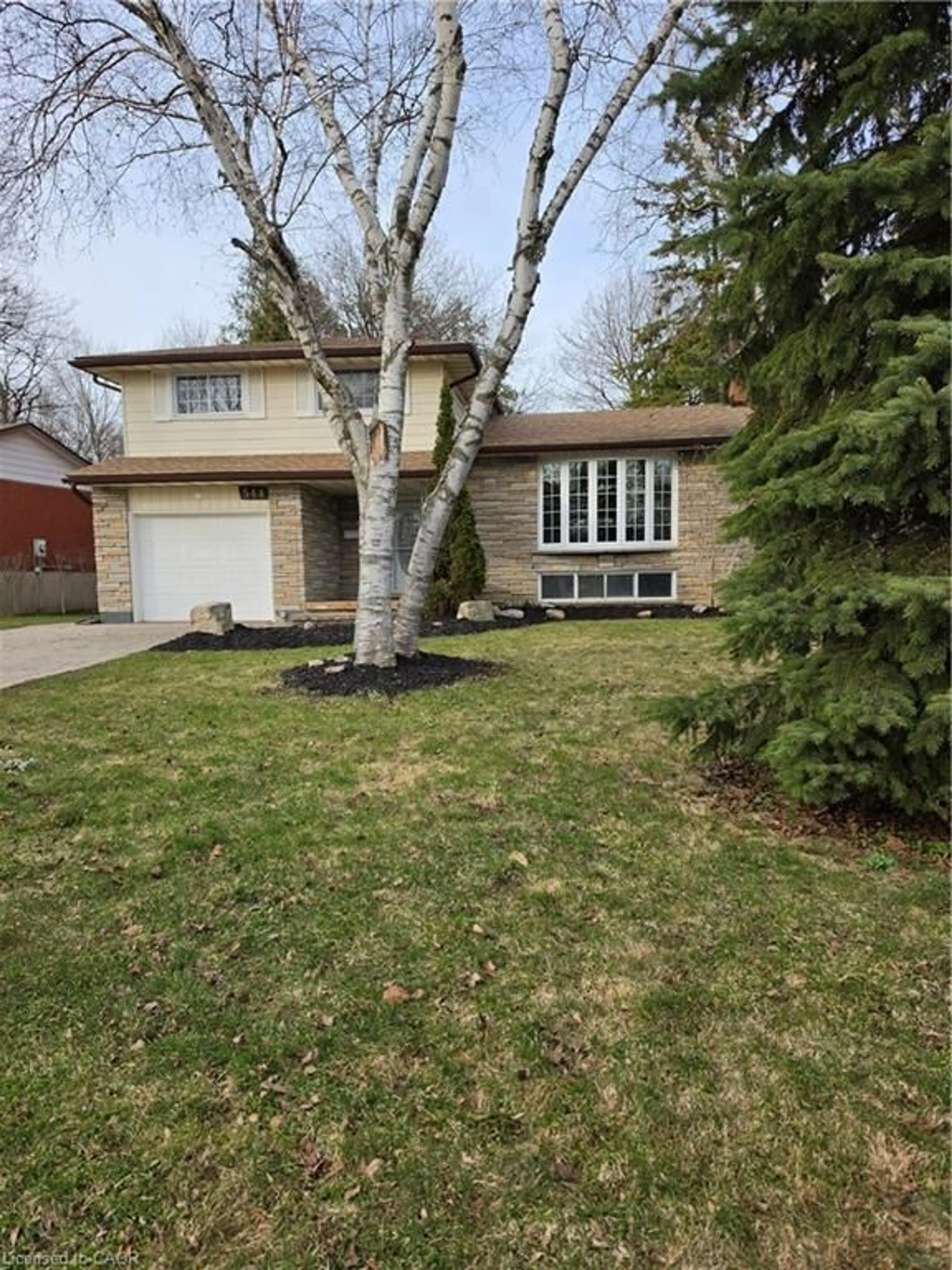 Home with brick exterior material, street for 544 Glen Manor Blvd, Waterloo Ontario N2L 4T6