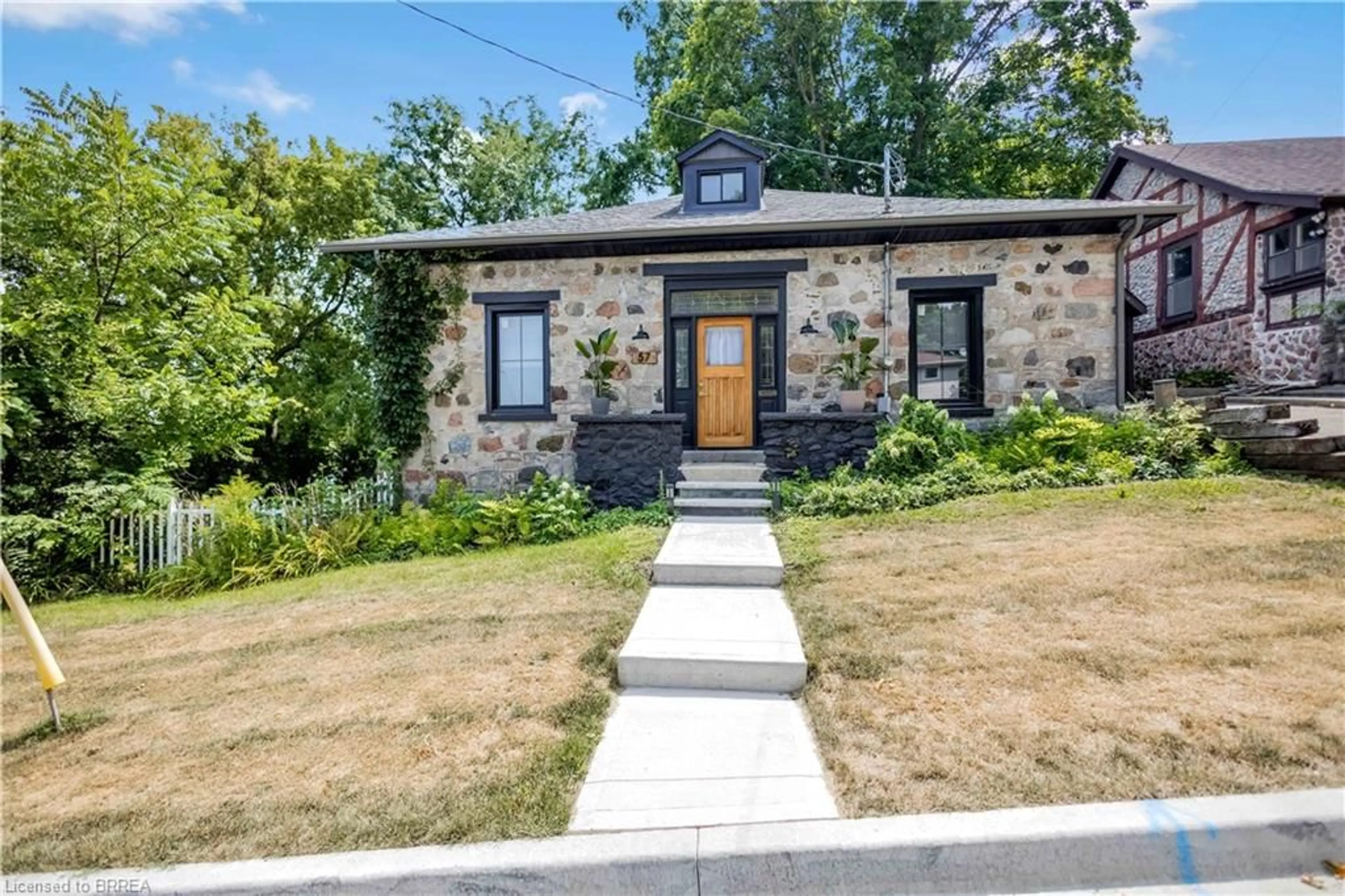 Home with brick exterior material, street for 57 Main St, Paris Ontario N3L 1E5