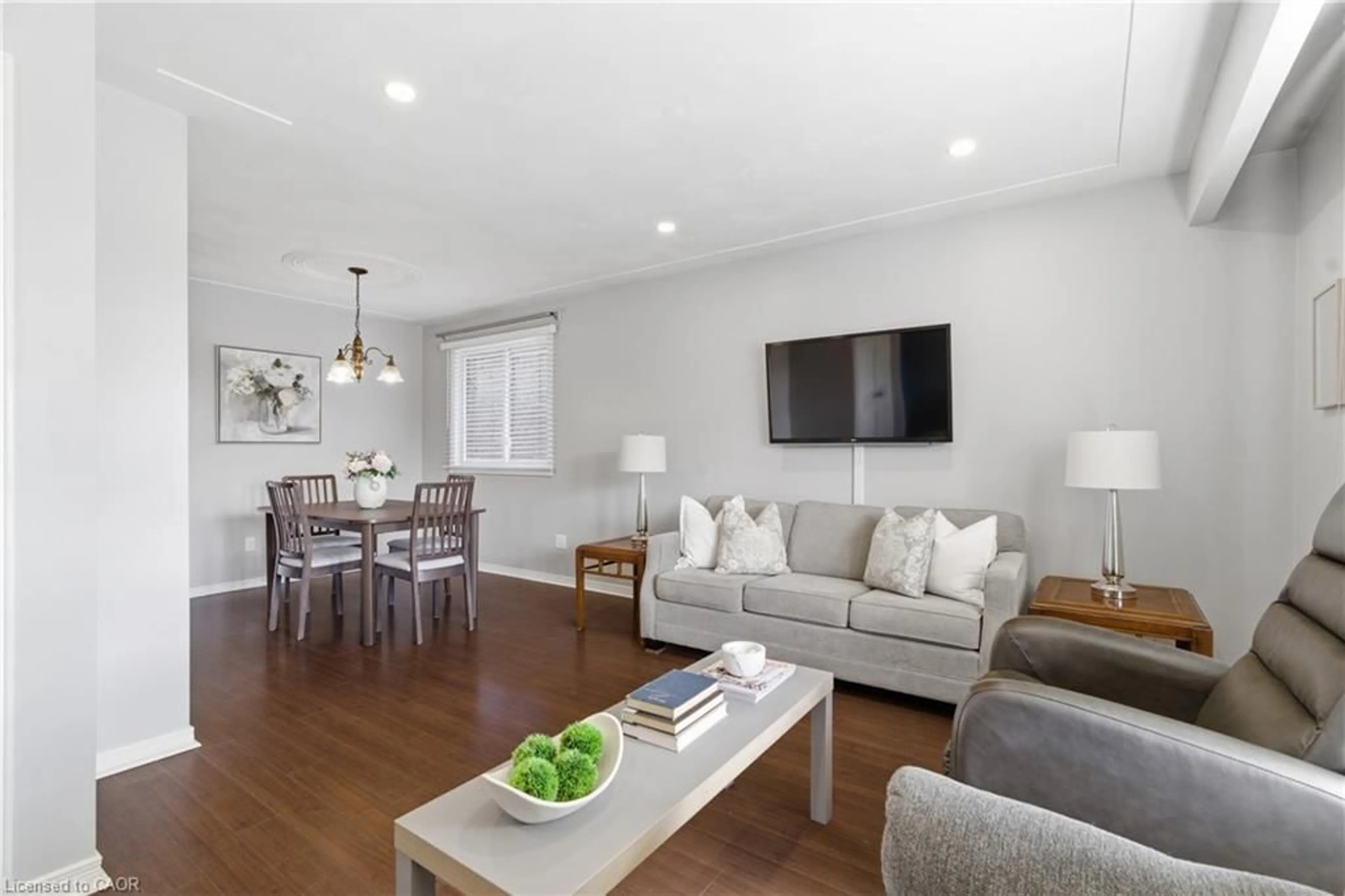 Living room with furniture, wood/laminate floor for 10 Brookside Cres, Kitchener Ontario N2N 1H1