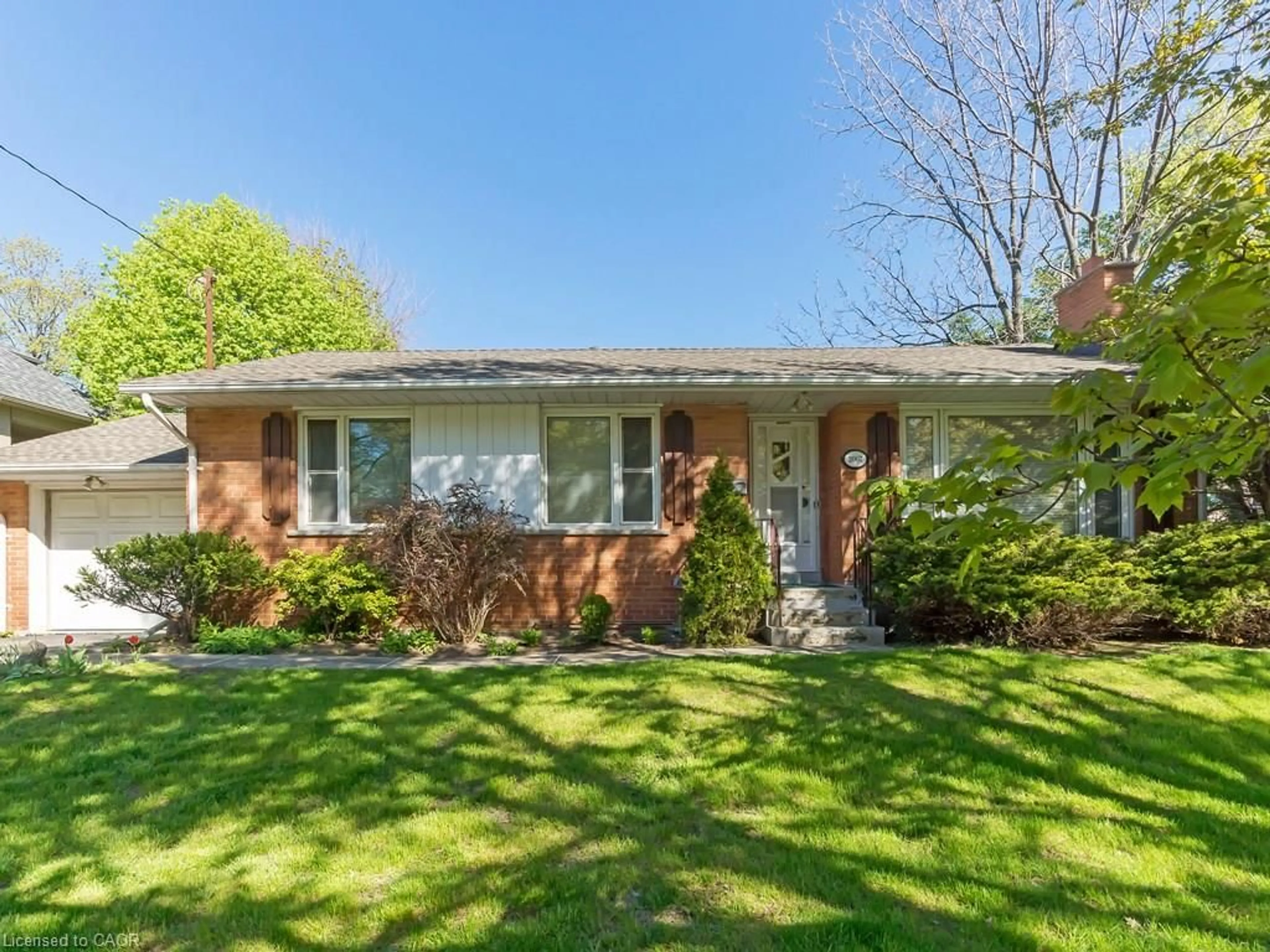 Home with brick exterior material, street for 2067 Devon Rd, Oakville Ontario L6J 2N1