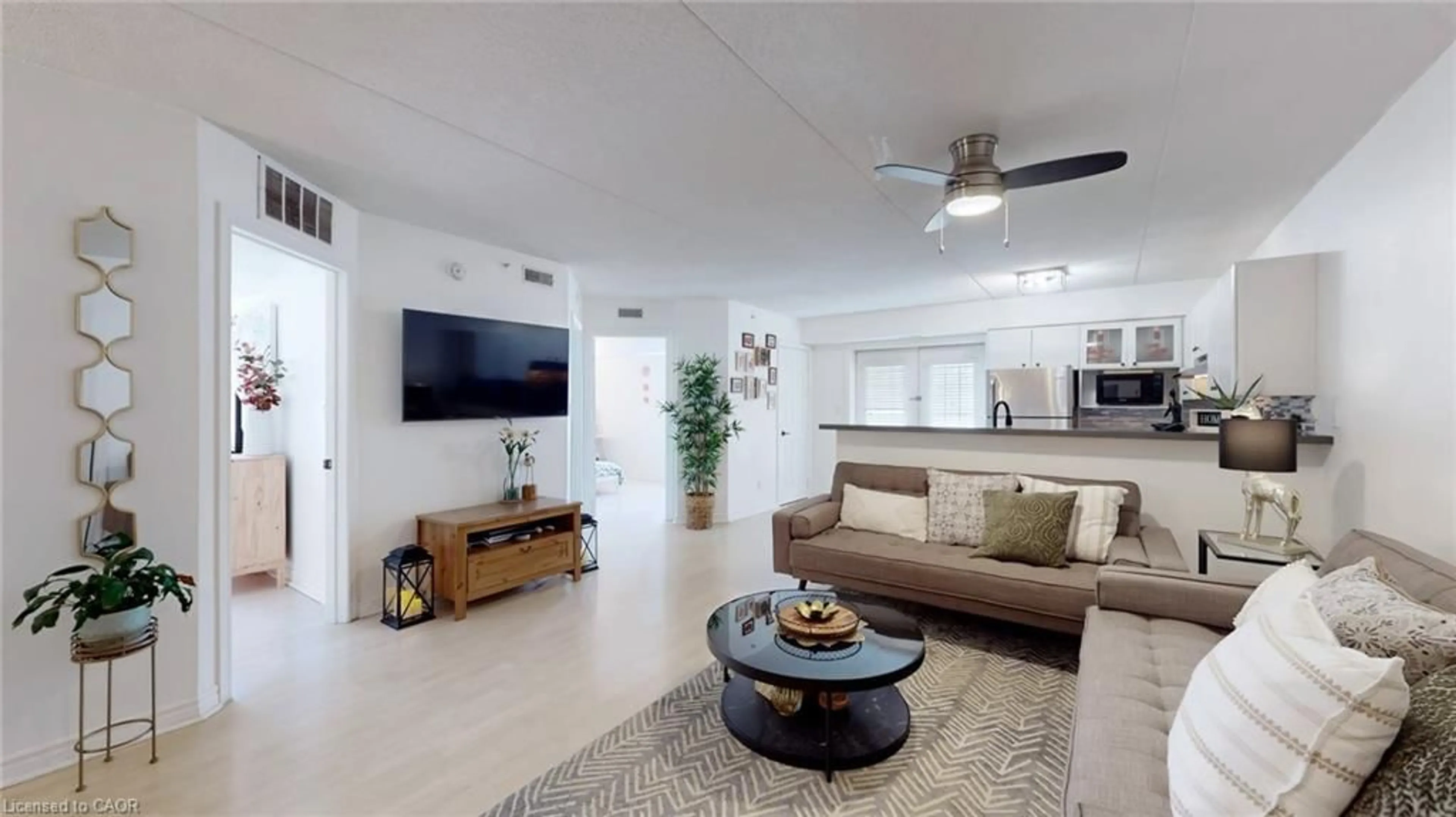 Living room with furniture, ceramic/tile floor for 4003 Kilmer Dr #111, Burlington Ontario L7M 4M1