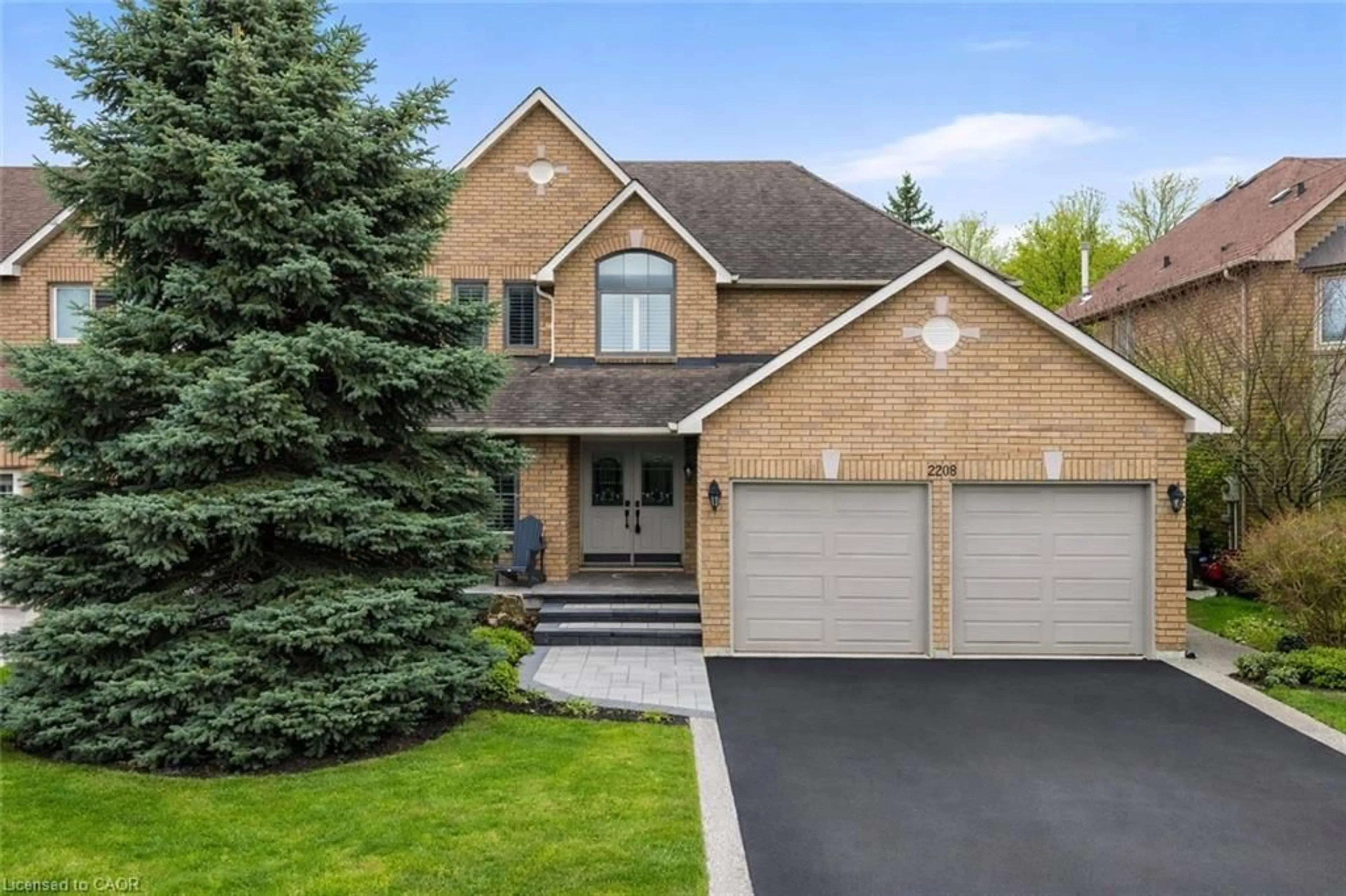 Home with brick exterior material, street for 2208 Brays Lane, Oakville Ontario L6M 3J7