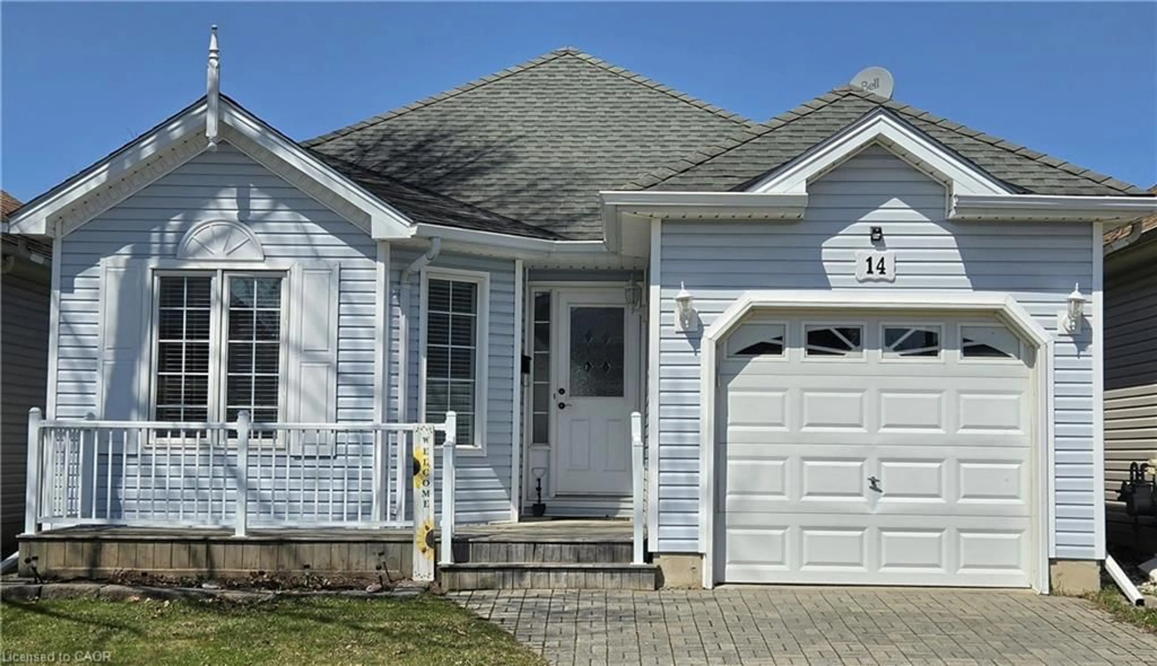 Home with vinyl exterior material, street for 14 Mallard Walk, Port Rowan Ontario N0E 1M0
