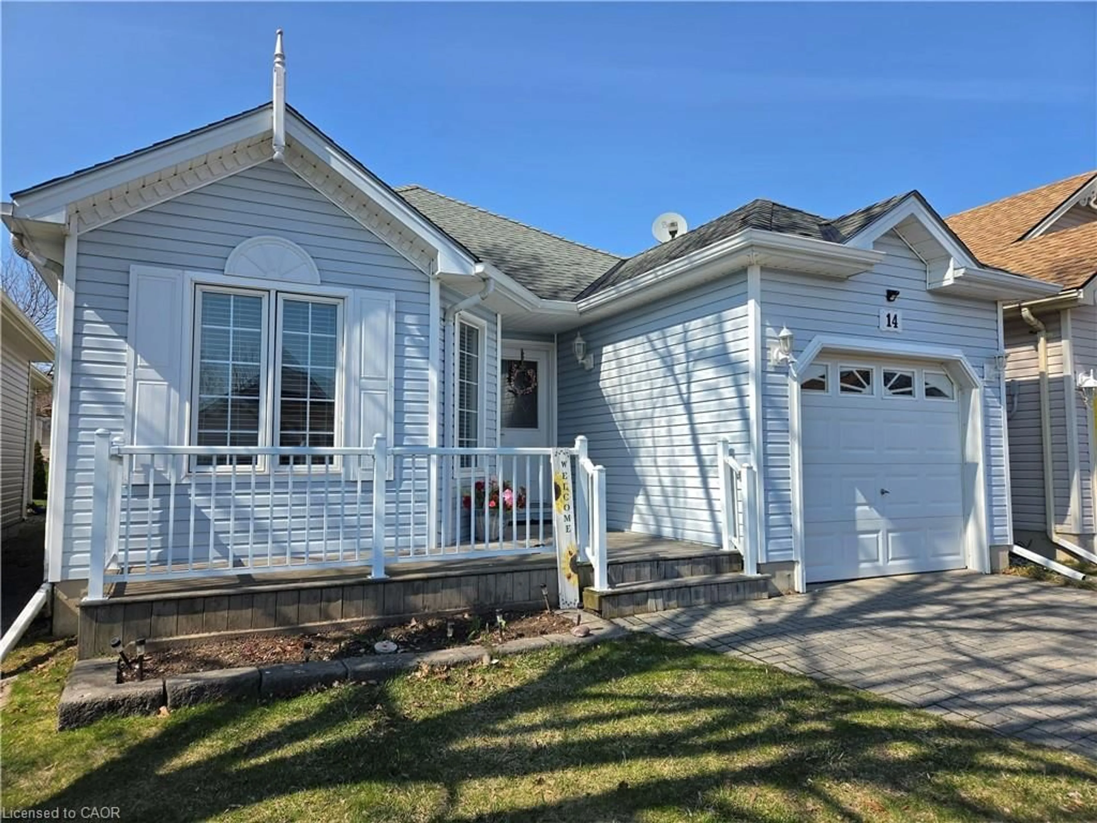 Home with vinyl exterior material, street for 14 Mallard Walk, Port Rowan Ontario N0E 1M0