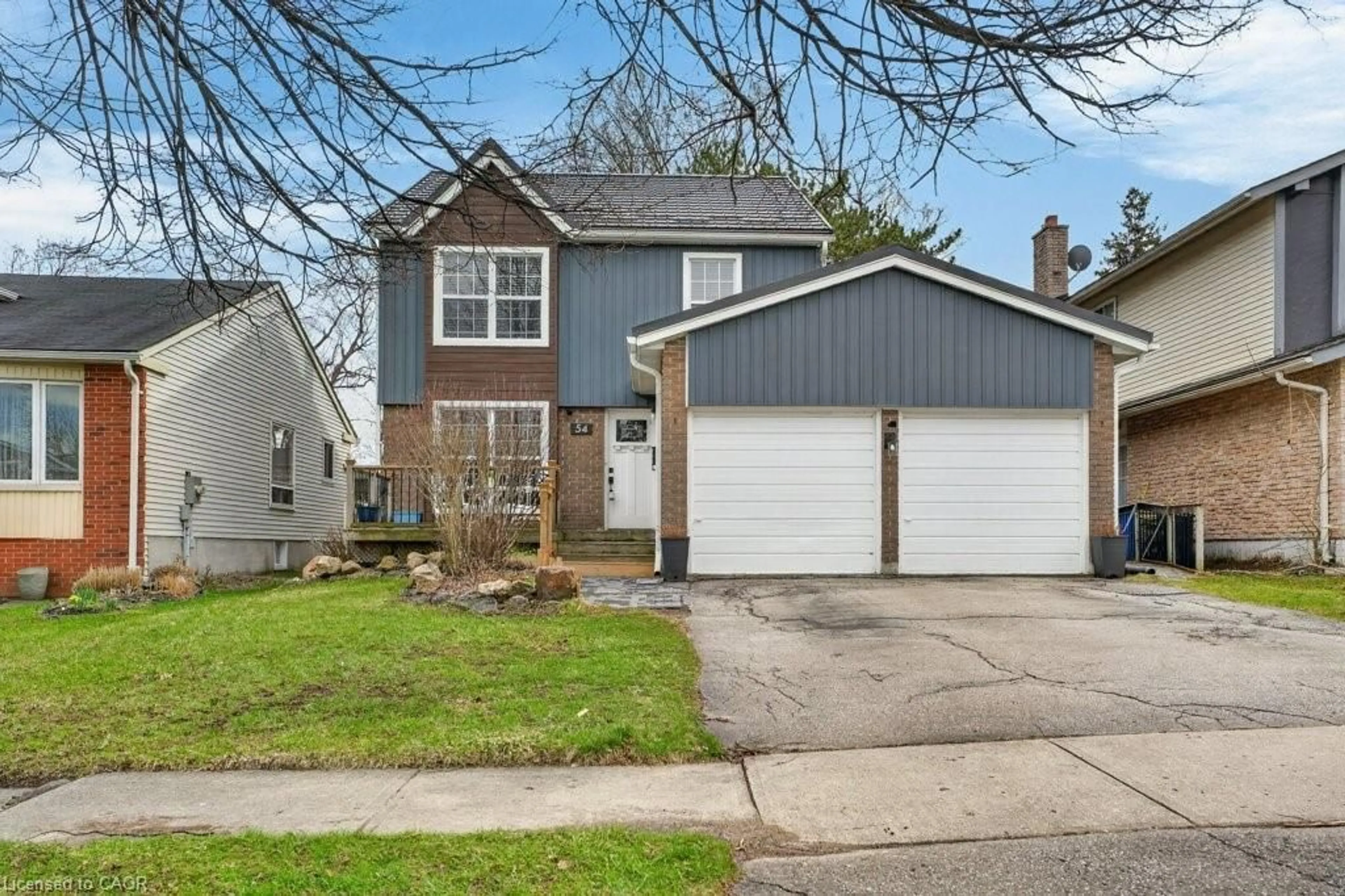 Home with vinyl exterior material, street for 54 Deerwood Cres, Kitchener Ontario N2N 1R3