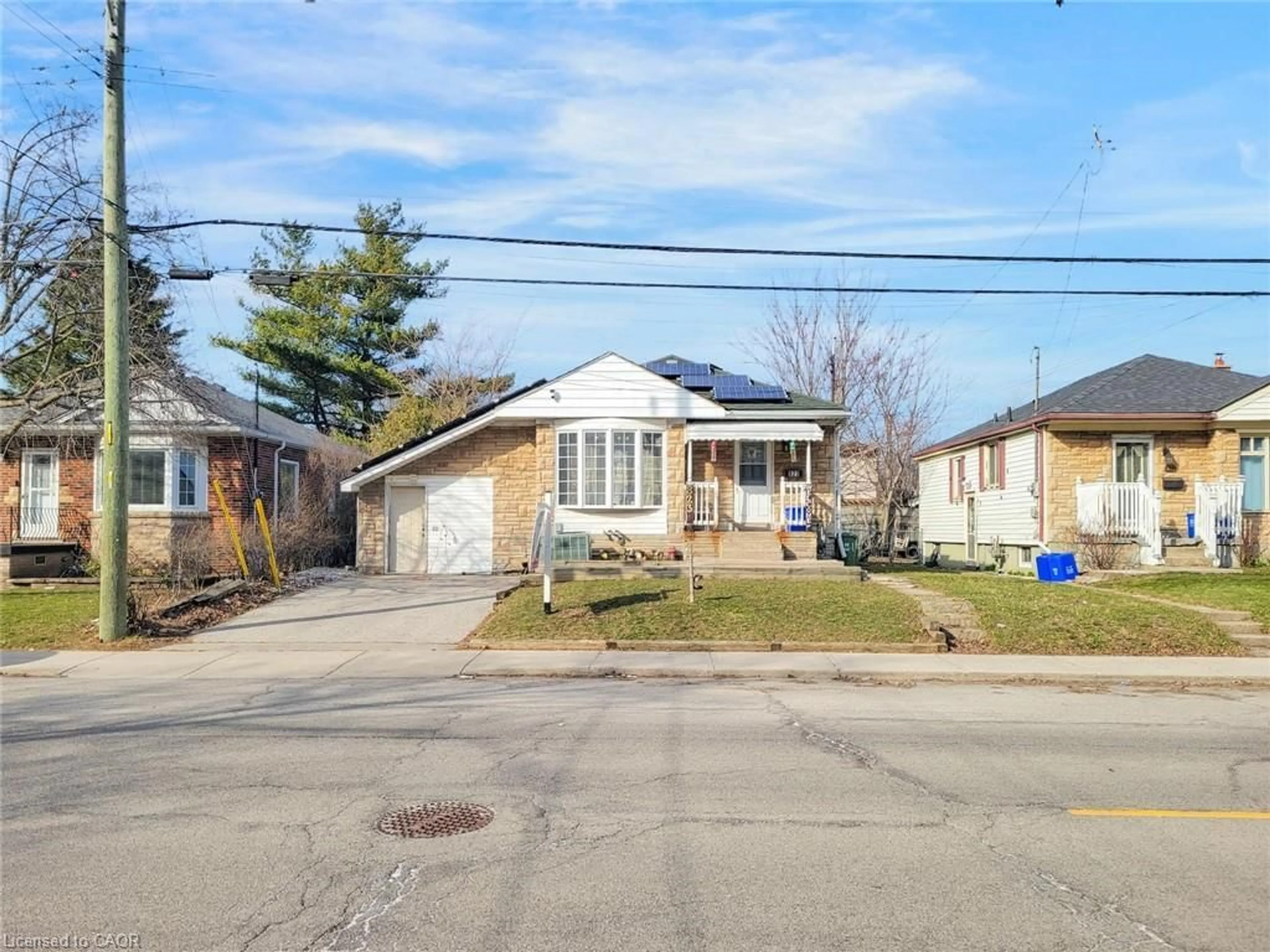 A pic from outside/outdoor area/front of a property/back of a property/a pic from drone, street for 823 Queensdale Ave, Hamilton Ontario L8V 1M7