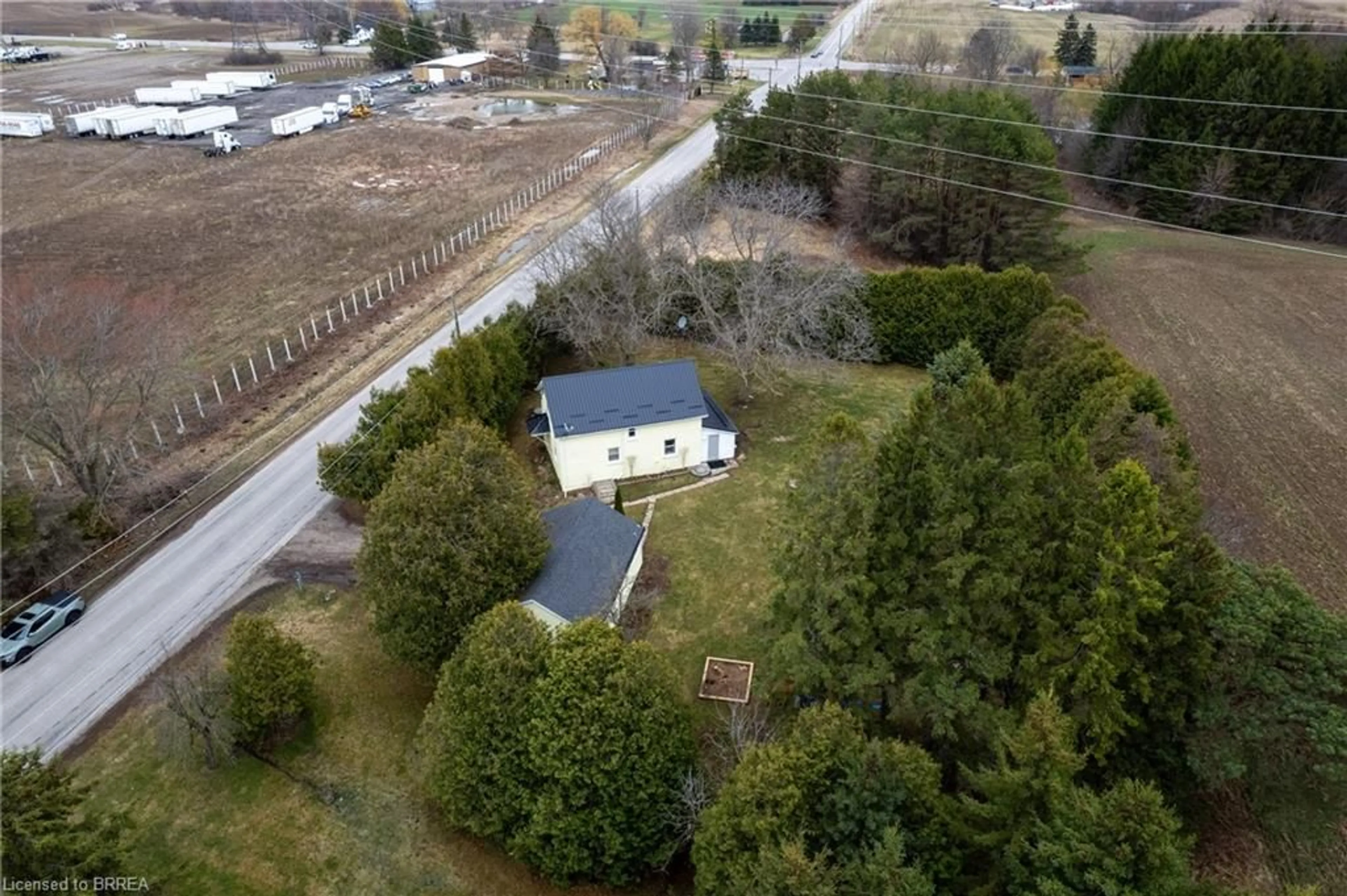 A pic from outside/outdoor area/front of a property/back of a property/a pic from drone, unknown for 18 Mcgill Rd, Mount Pleasant Ontario N0E 1K0