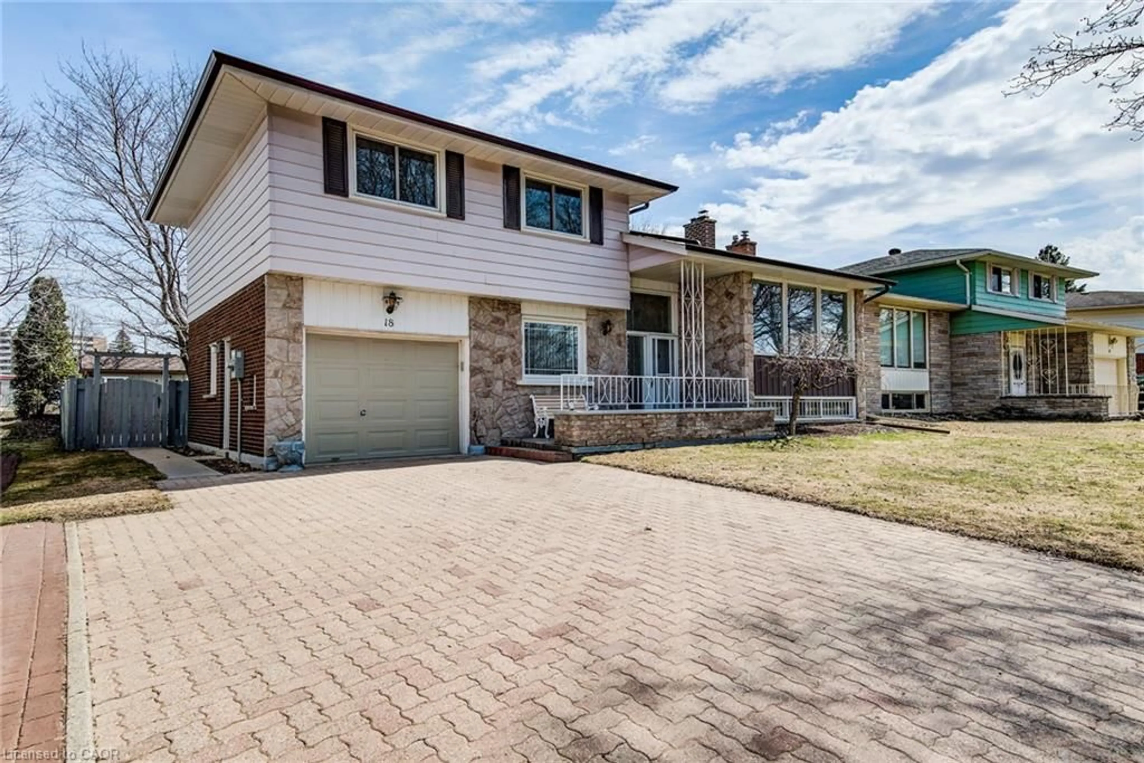 Home with brick exterior material, street for 18 Champlain Cres, Kitchener Ontario N2B 2Y6