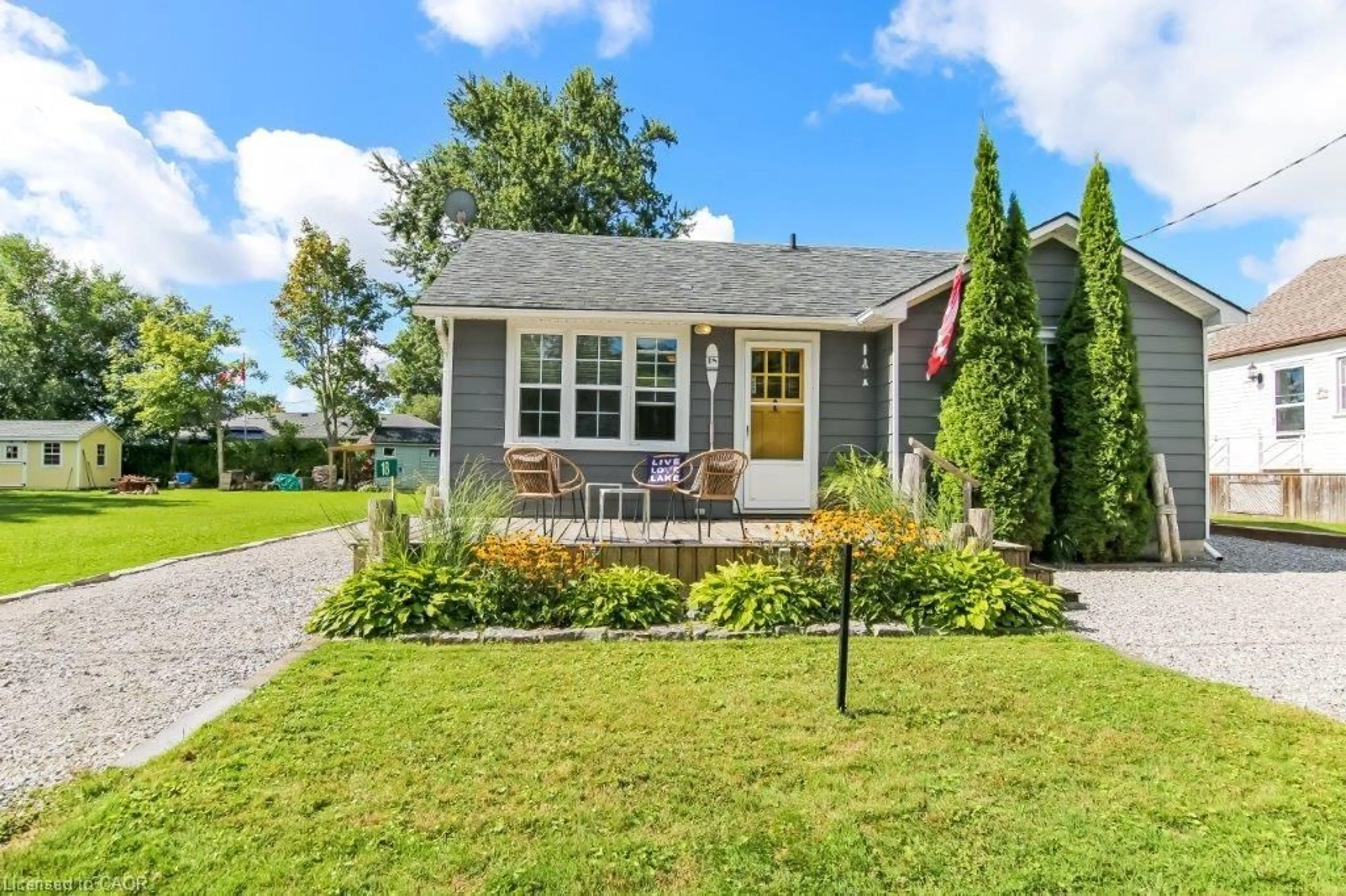 Home with vinyl exterior material, street for 18 Isabel St, Turkey Point Ontario N0E 1T0