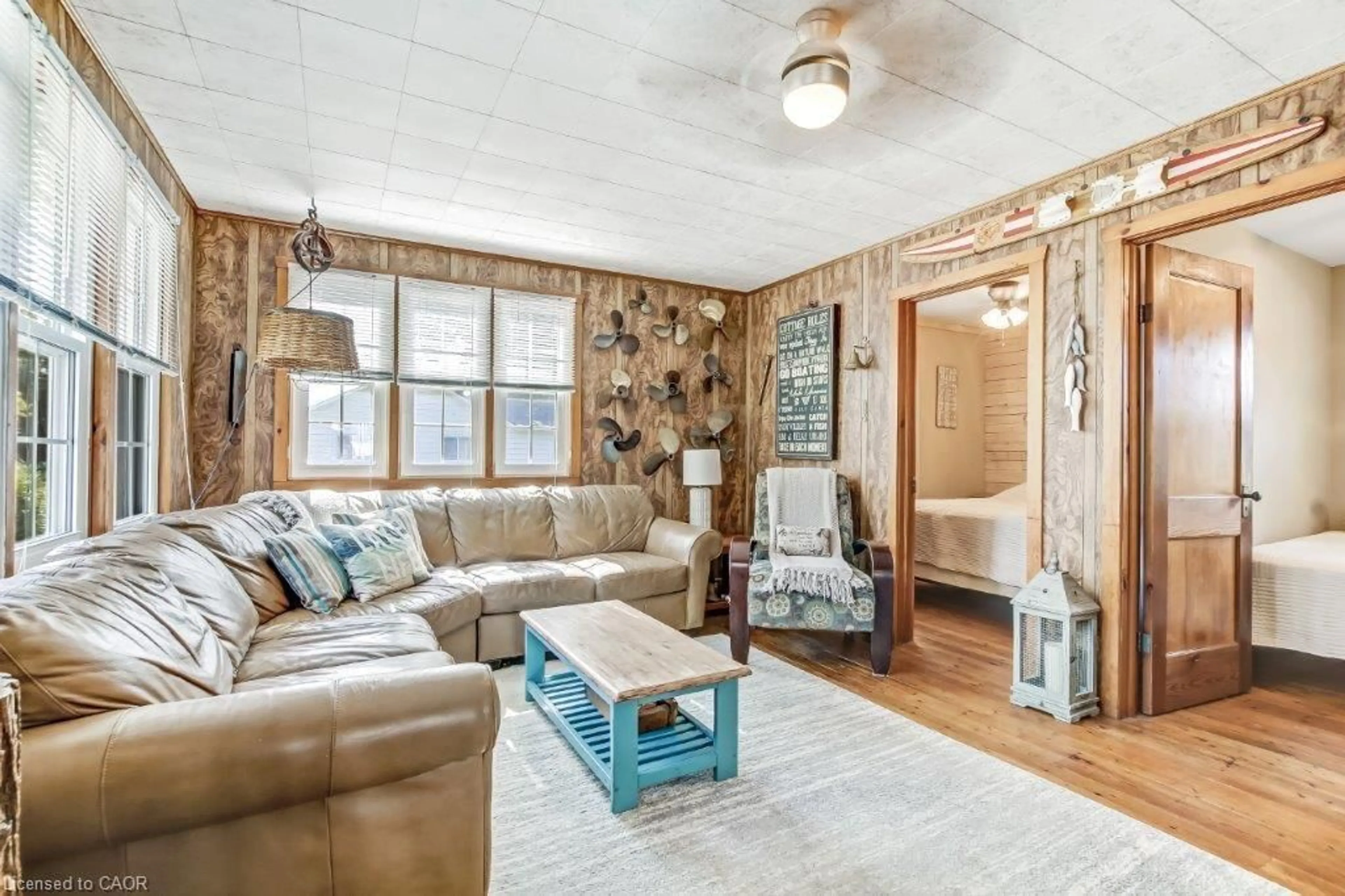 Living room with furniture, unknown for 18 Isabel St, Turkey Point Ontario N0E 1T0