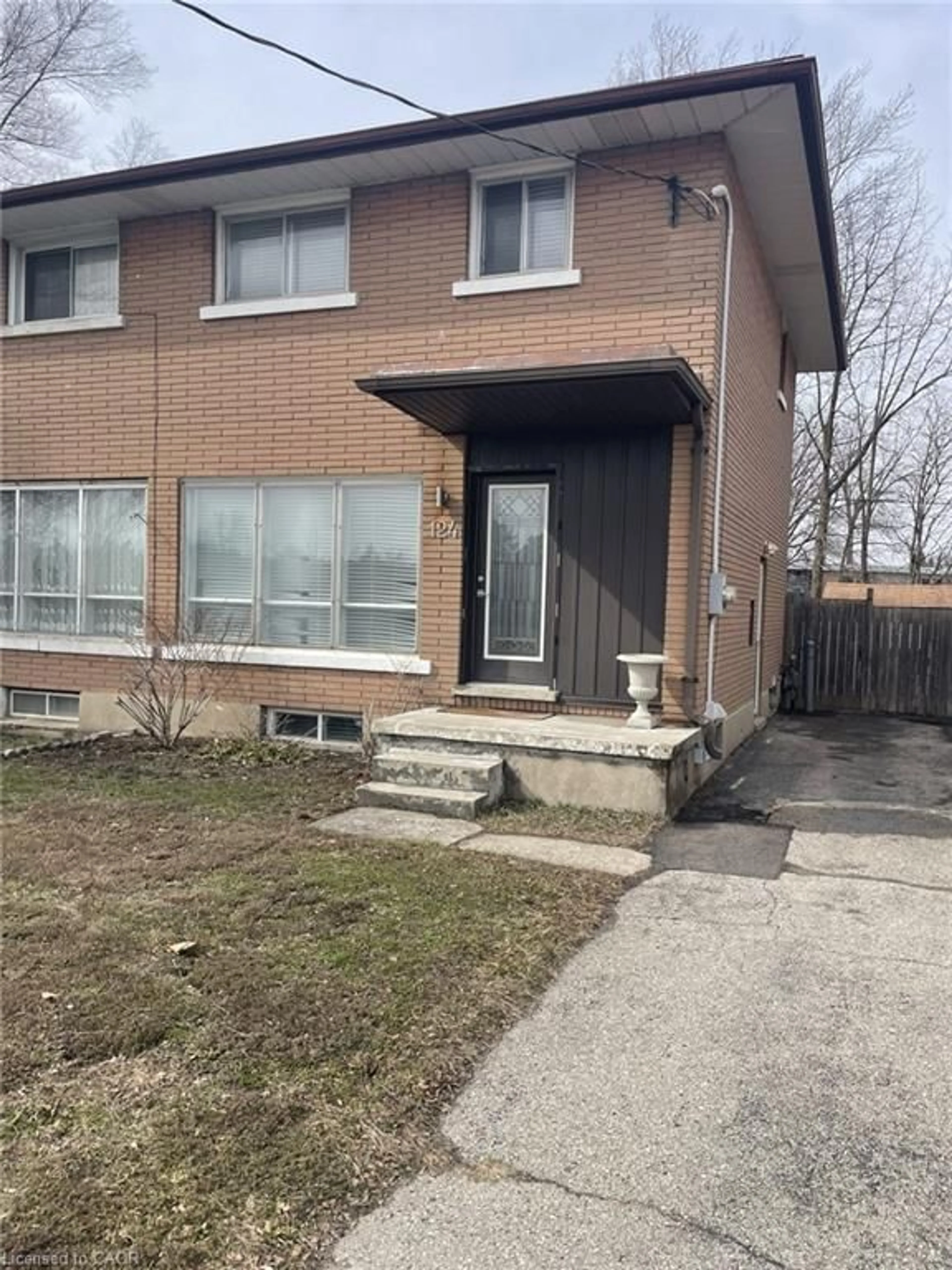 Home with brick exterior material, street for 124 Avalon Pl, Kitchener Ontario N2M 4N7