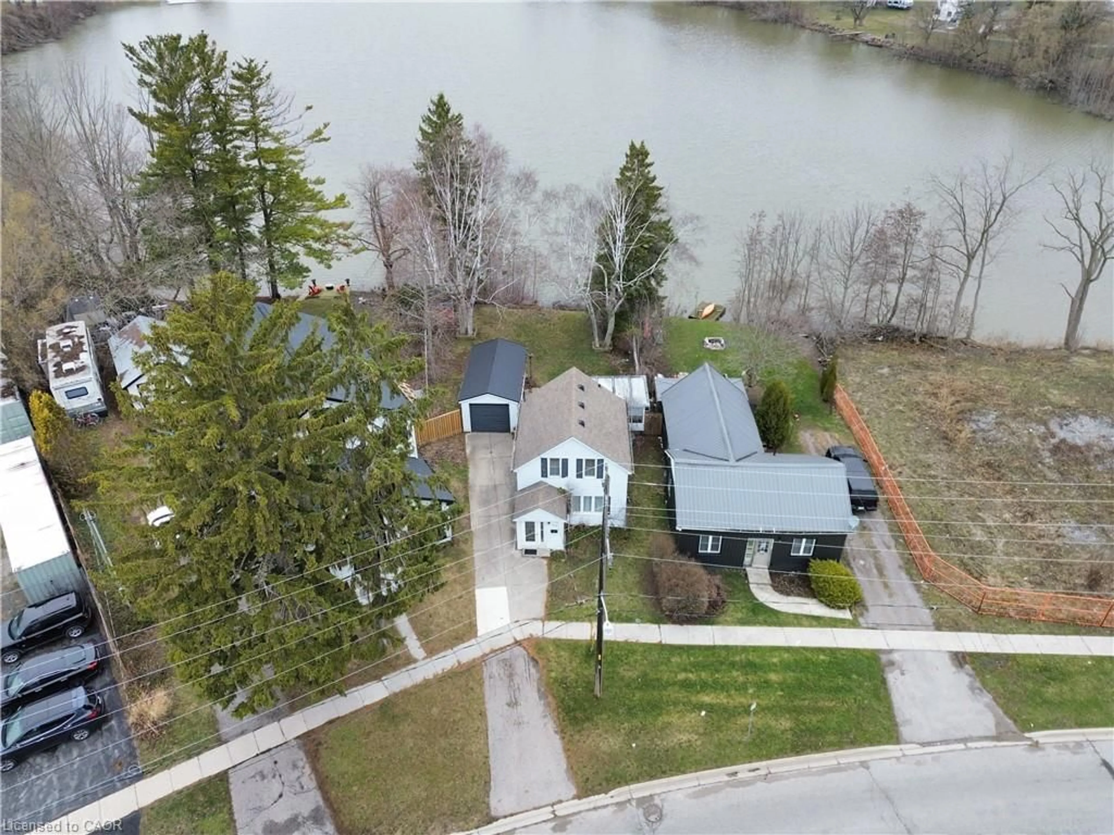 A pic from outside/outdoor area/front of a property/back of a property/a pic from drone, water/lake/river/ocean view for 221 Chapman St, Norfolk Ontario N0A 1N0