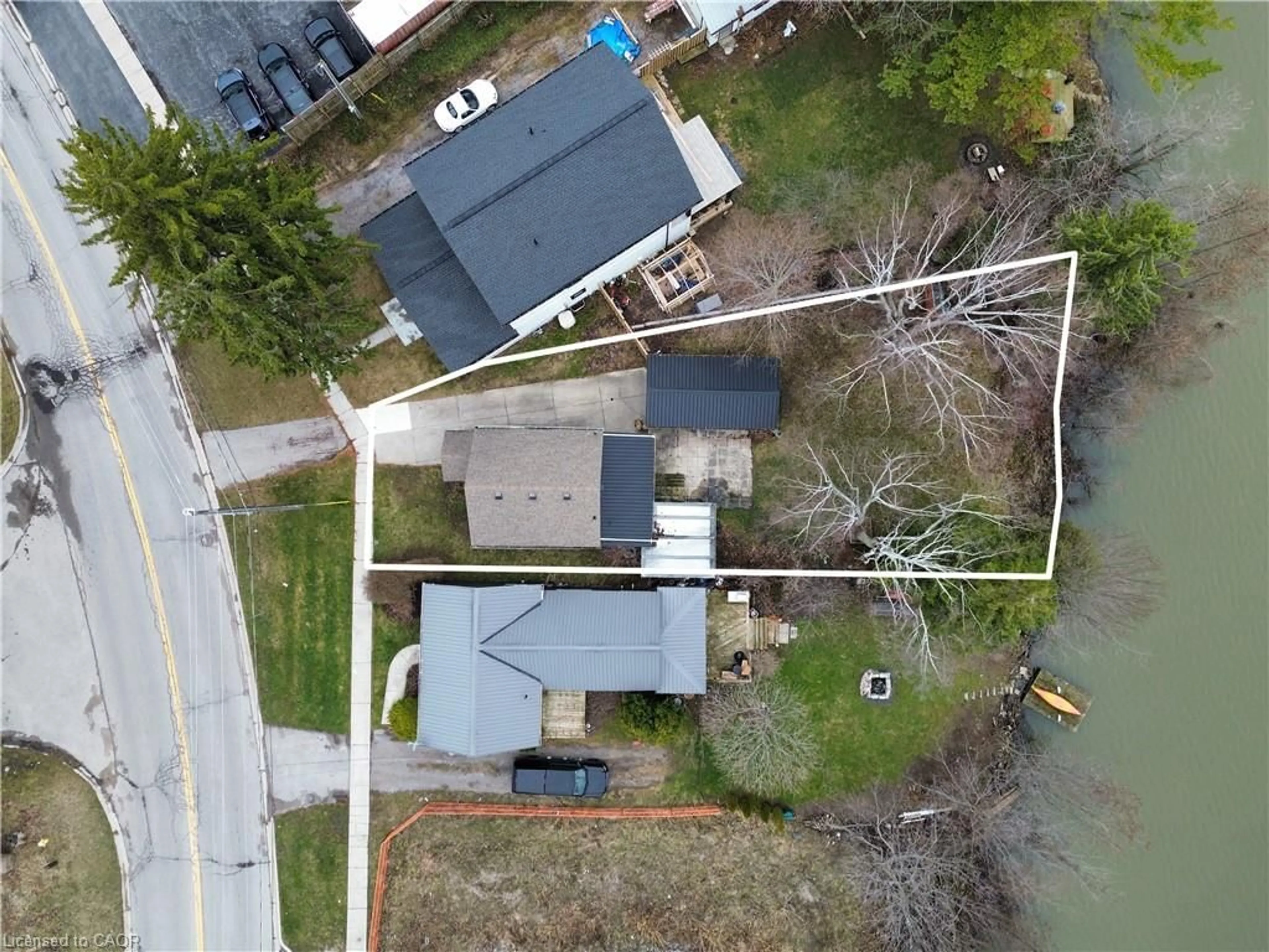 A pic from outside/outdoor area/front of a property/back of a property/a pic from drone, street for 221 Chapman St, Norfolk Ontario N0A 1N0