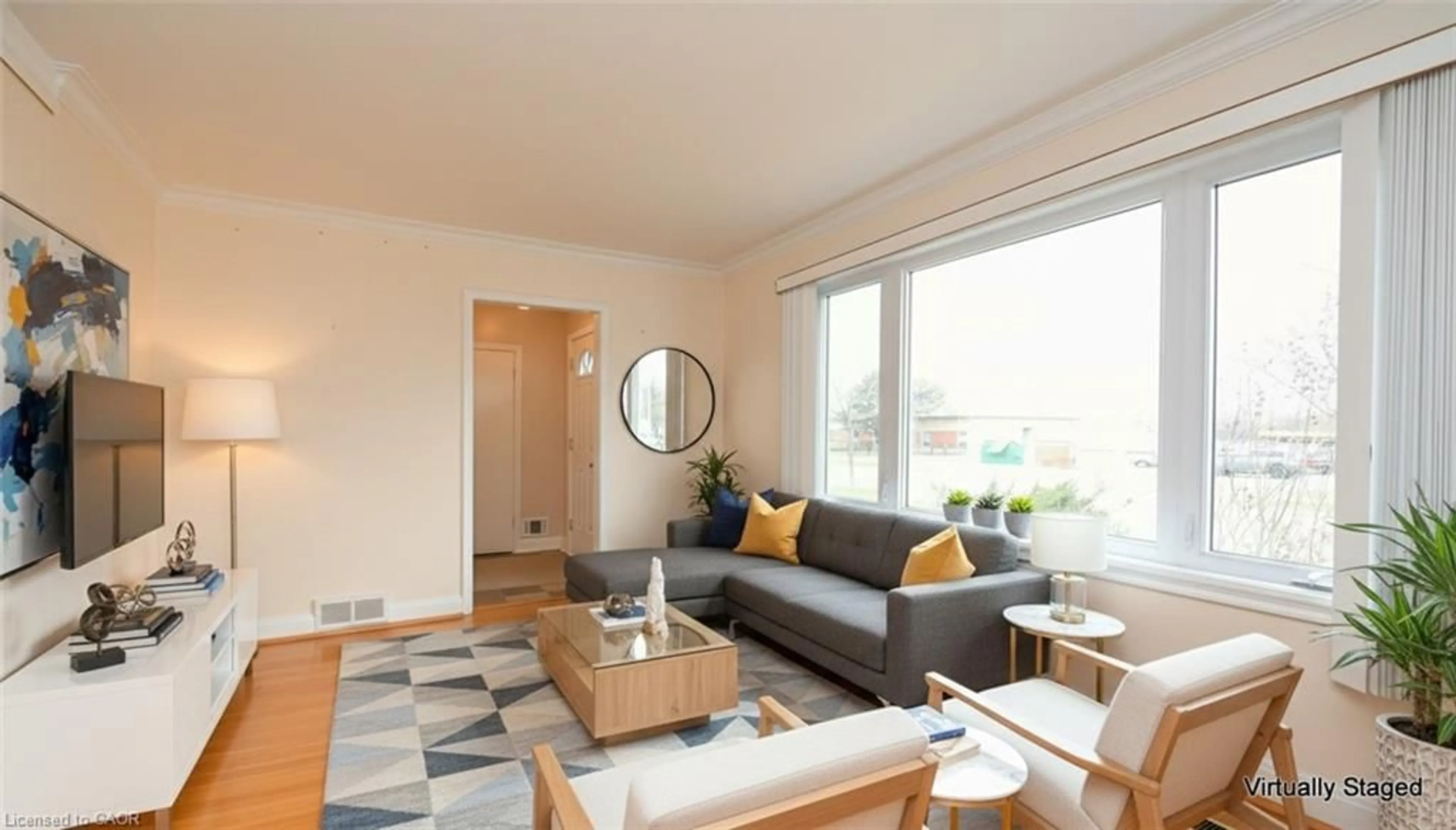 Living room with furniture, wood/laminate floor for 65 Hadrian Dr, Etobicoke Ontario M9W 1V6