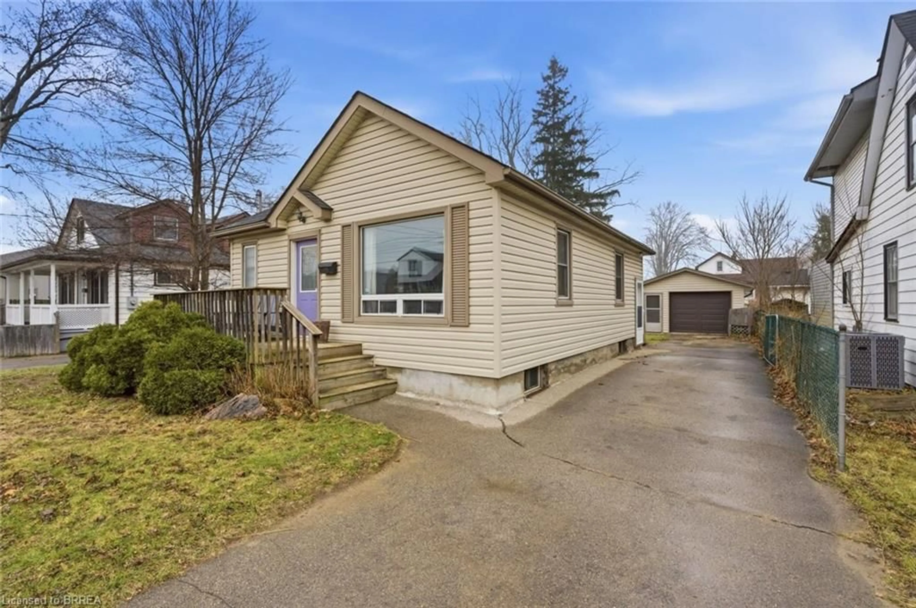 Home with vinyl exterior material, street for 455 St. Paul Ave, Brantford Ontario N3R 1P1