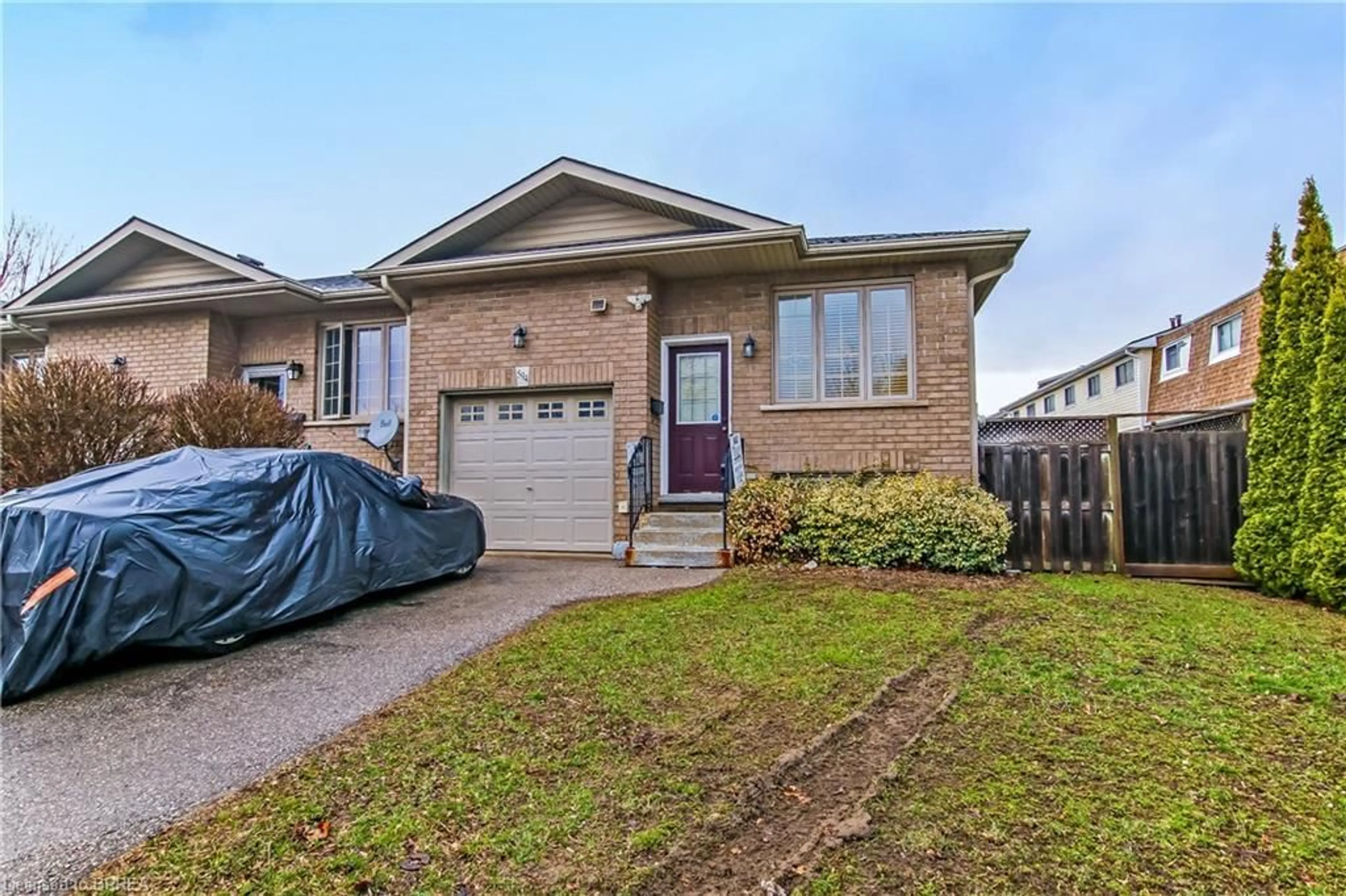 Home with brick exterior material, street for 594 Grey St, Brantford Ontario N3S 4Y1