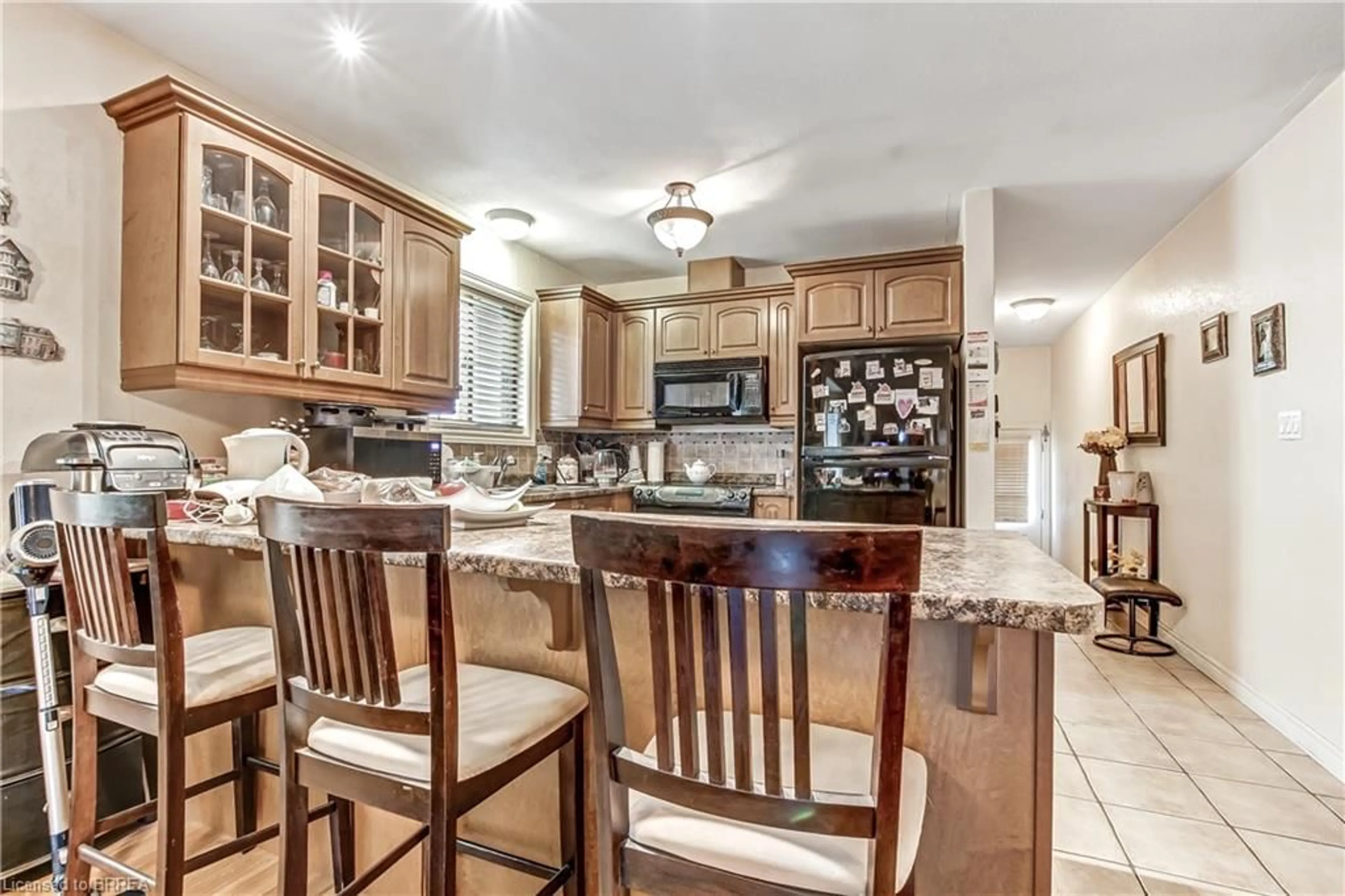 Open concept kitchen, ceramic/tile floor for 594 Grey St, Brantford Ontario N3S 4Y1