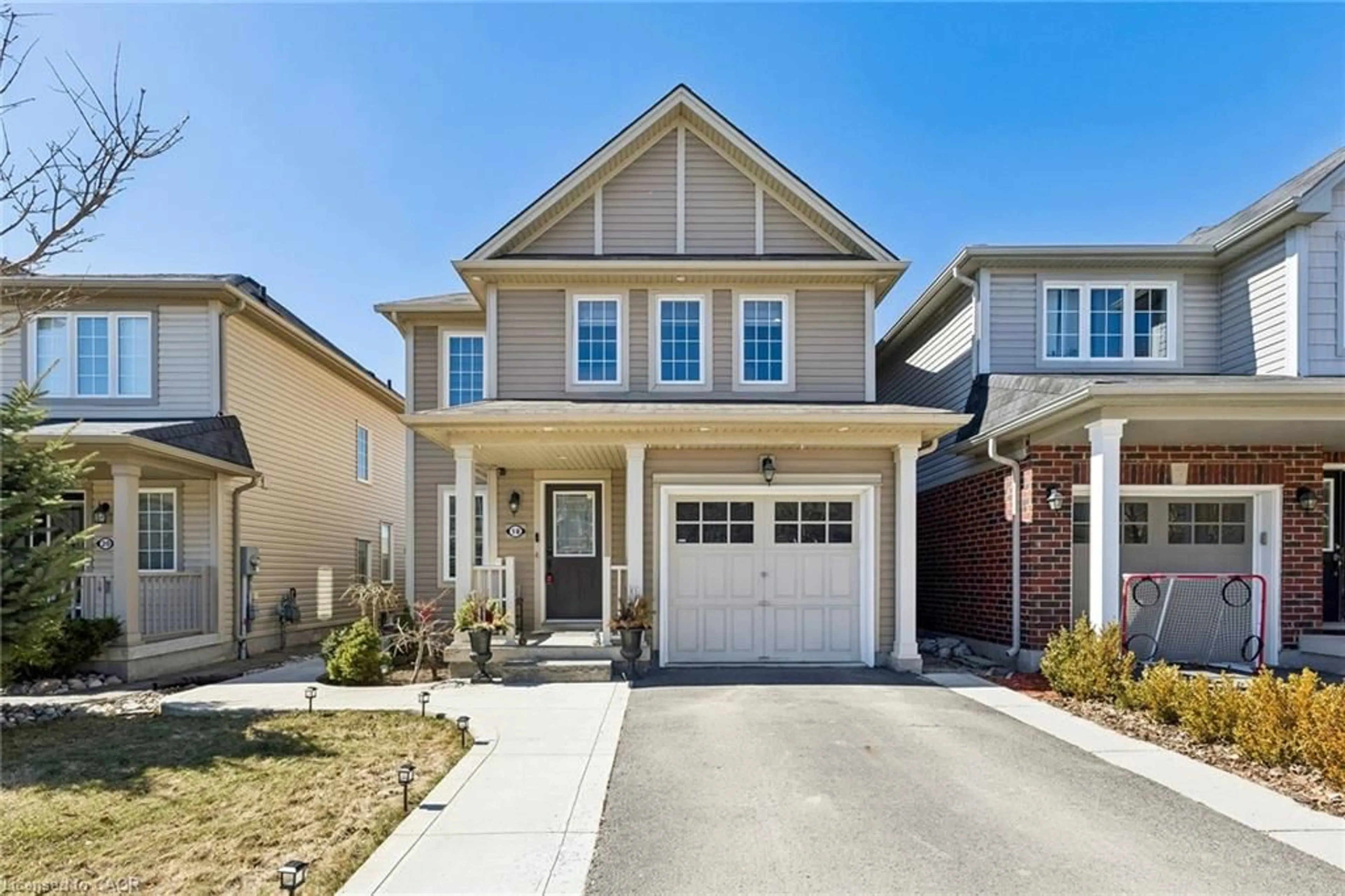 Home with brick exterior material, street for 18 Merritt Lane, Brantford Ontario N3T 0E8