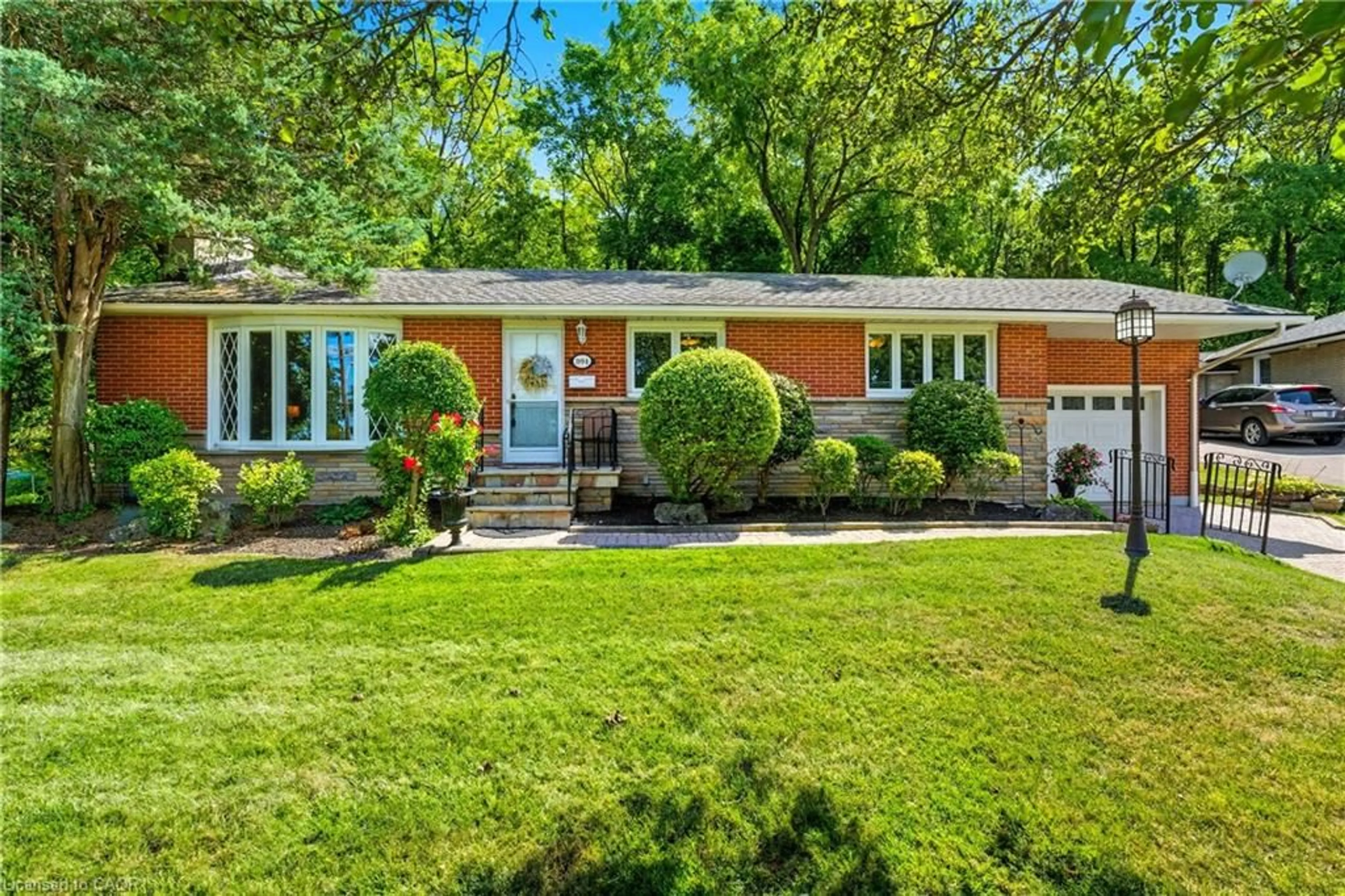 Home with brick exterior material, street for 894 Bishop Pl, Ancaster Ontario L9G 3E5