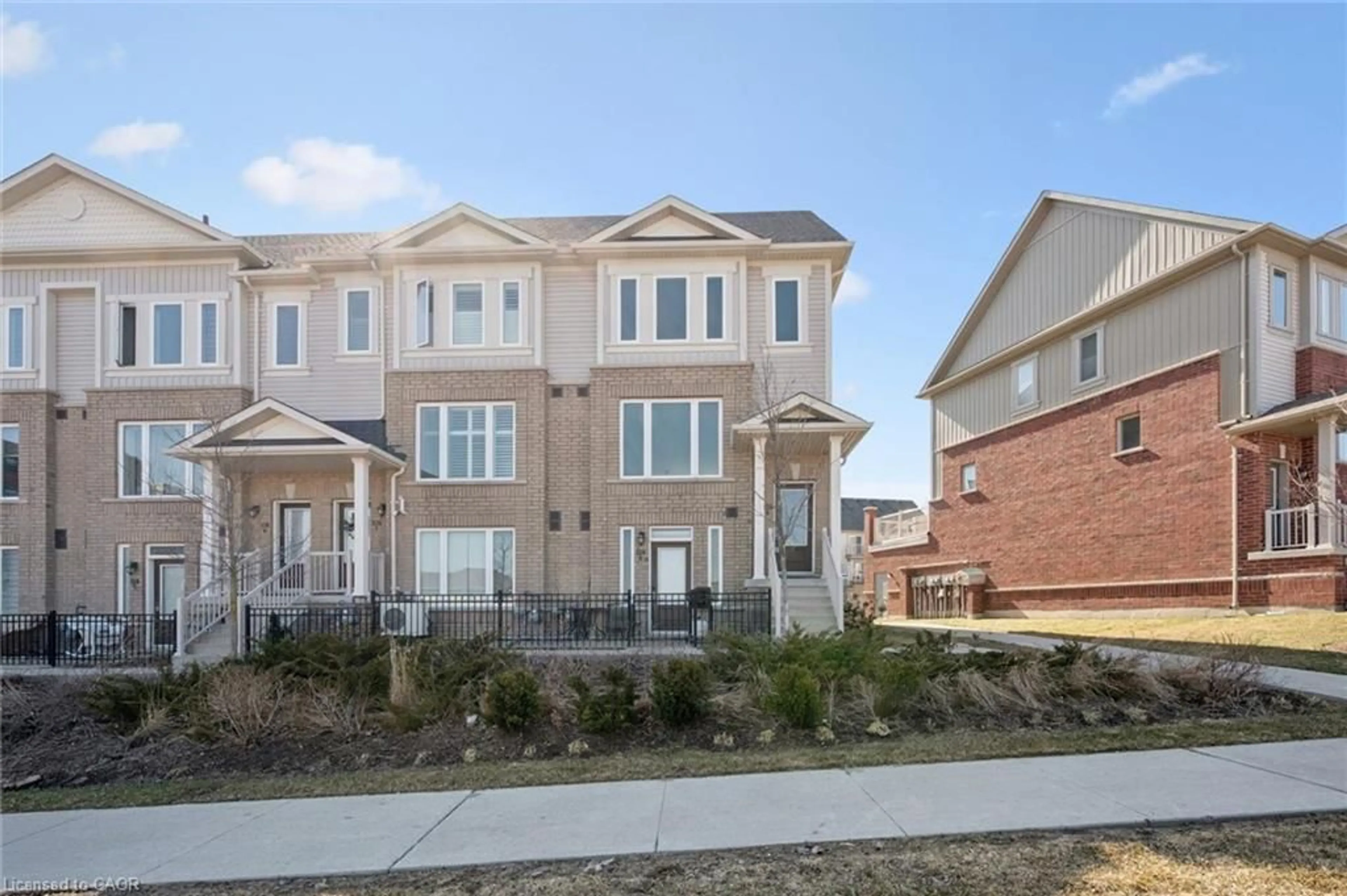 Home with brick exterior material, street for 126 Watson Pky #9, Guelph Ontario N1E 0P6