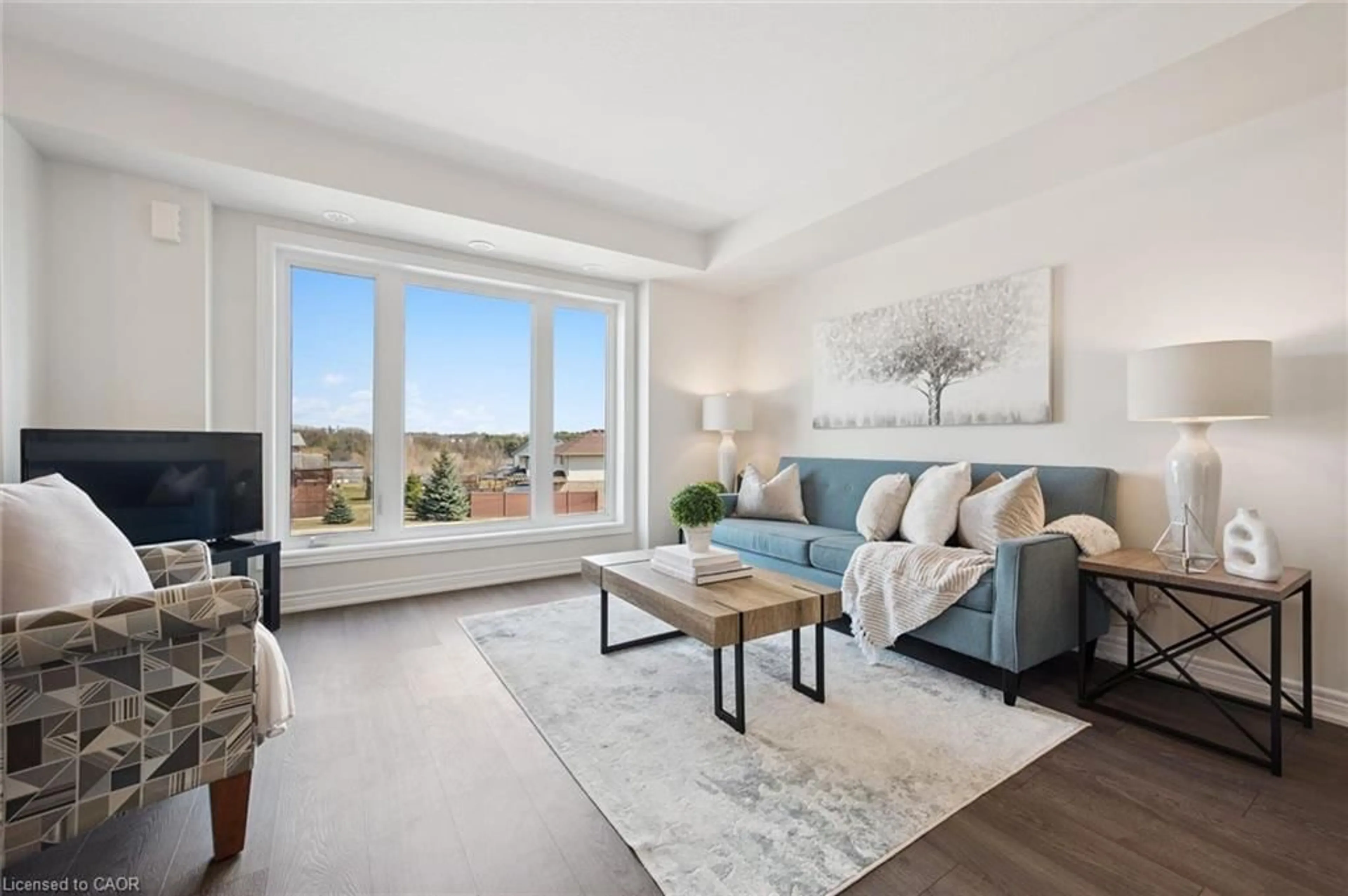 Living room with furniture, unknown for 126 Watson Pky #9, Guelph Ontario N1E 0P6