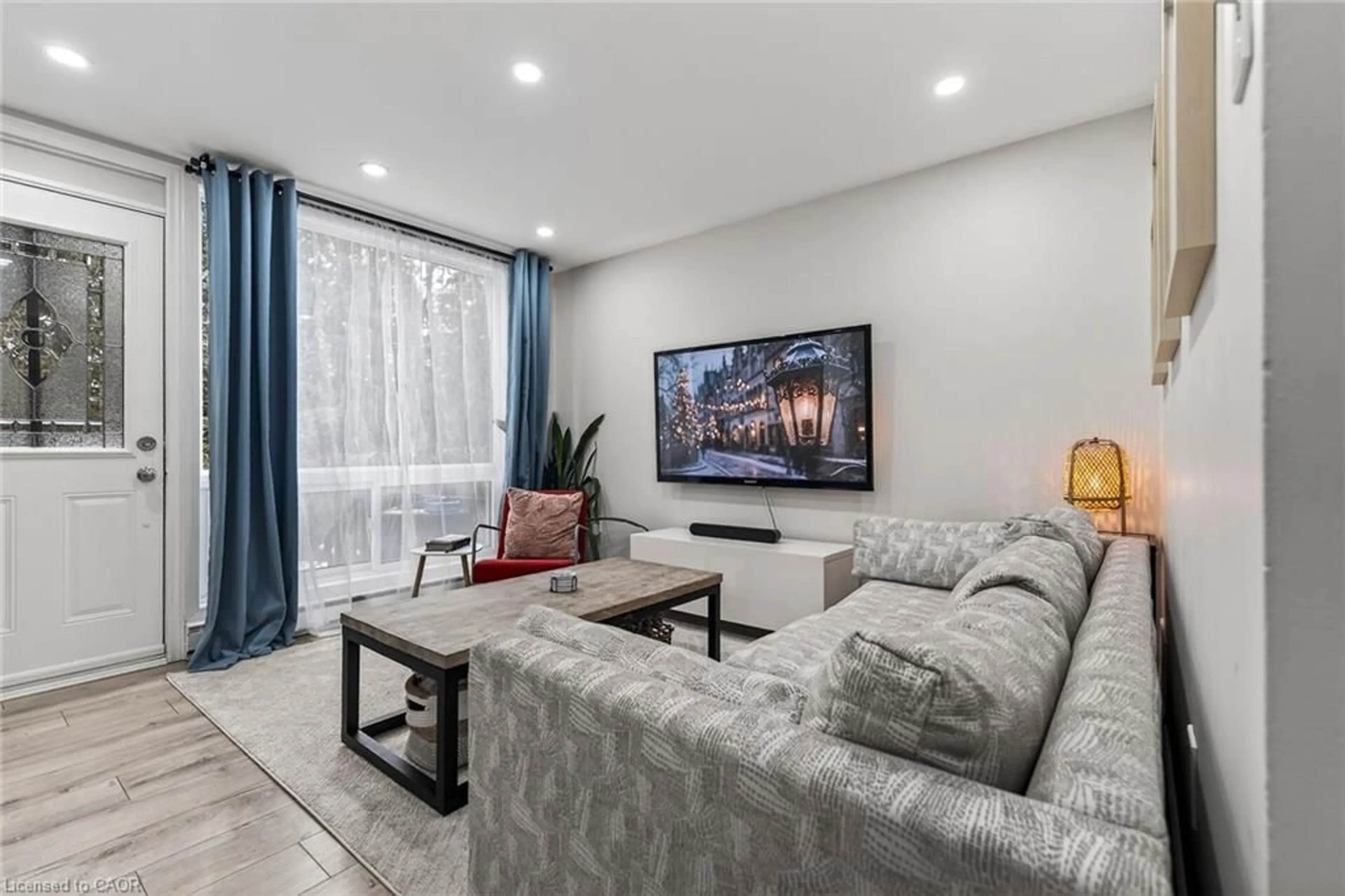 Living room with furniture, unknown for 25 Britten Close #B63, Hamilton Ontario L9C 4J8