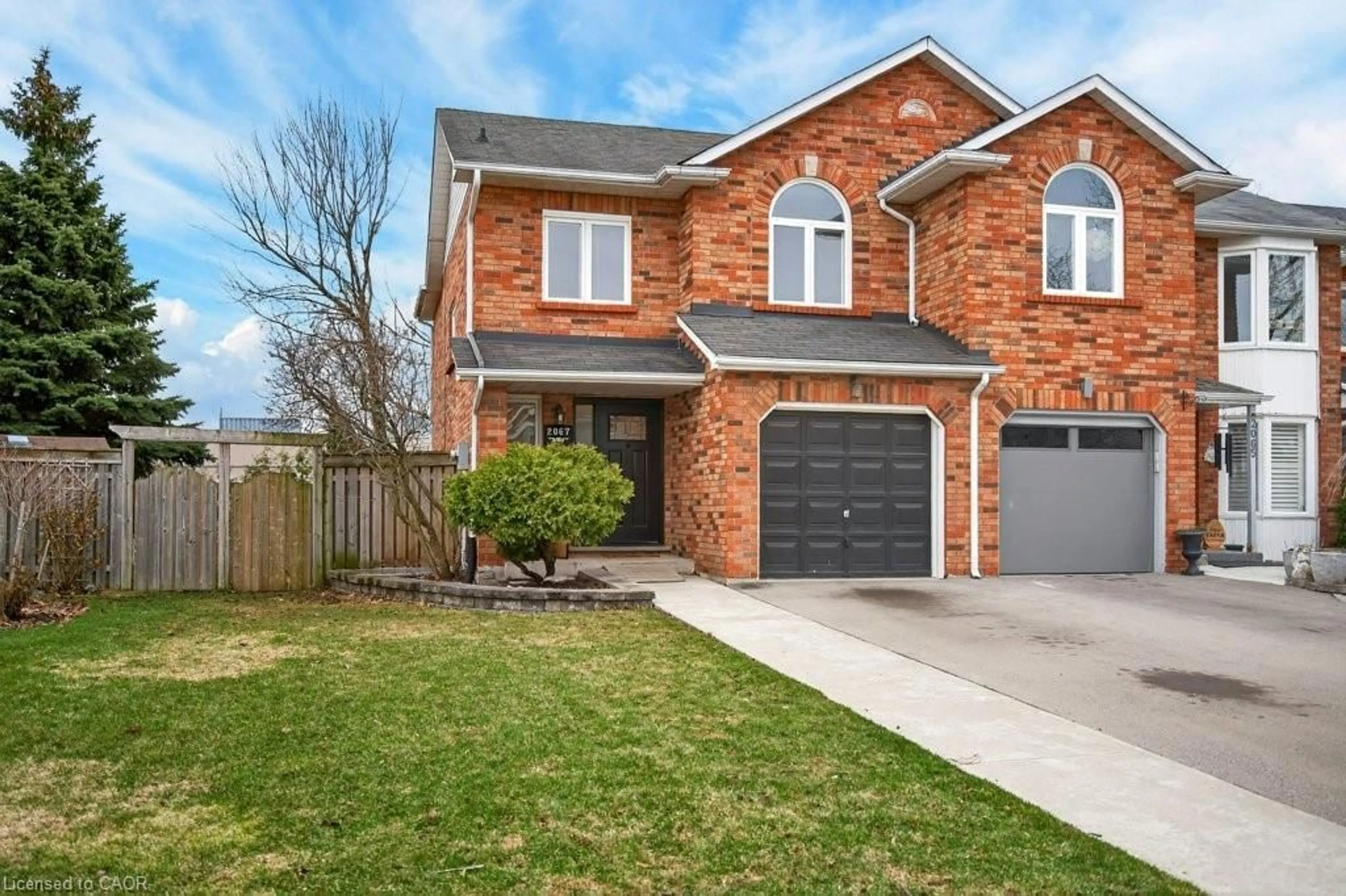 Home with brick exterior material, street for 2067 Chrisdon Rd, Burlington Ontario L7M 3W9