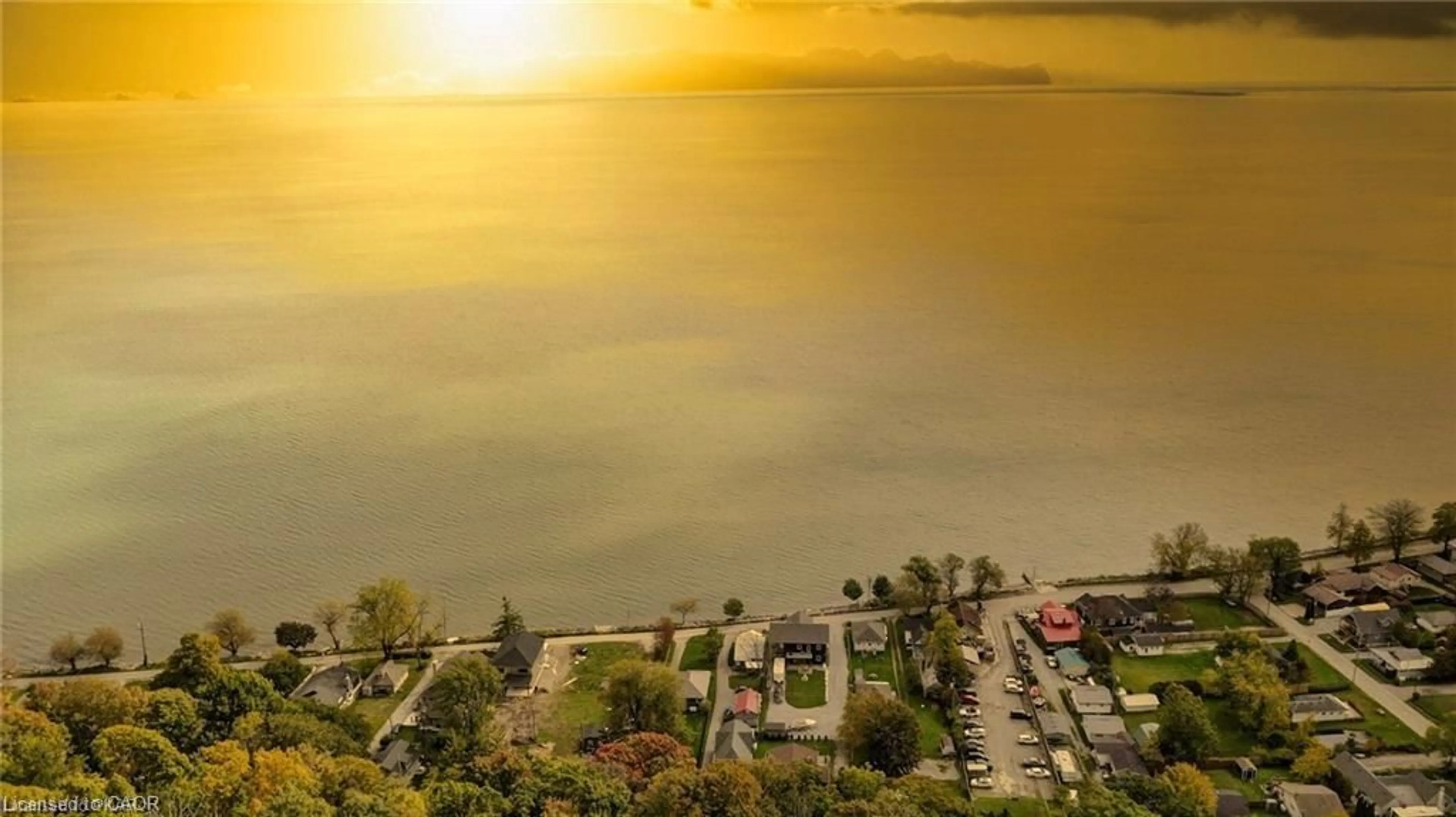 A pic from outside/outdoor area/front of a property/back of a property/a pic from drone, water/lake/river/ocean view for 37B Cedar Dr, Turkey Point Ontario N0E 1T0