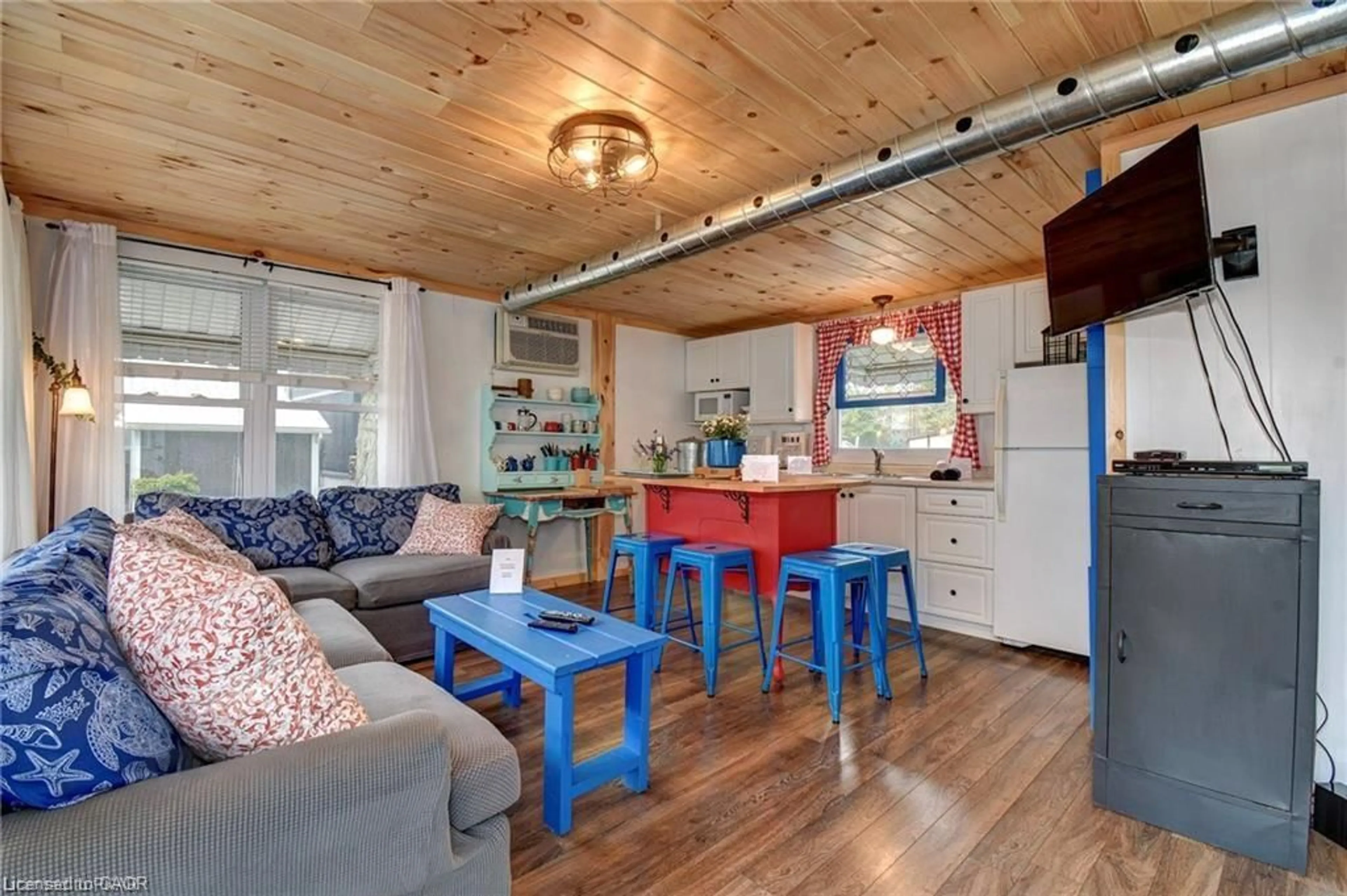 Open concept kitchen, wood/laminate floor for 37B Cedar Dr, Turkey Point Ontario N0E 1T0