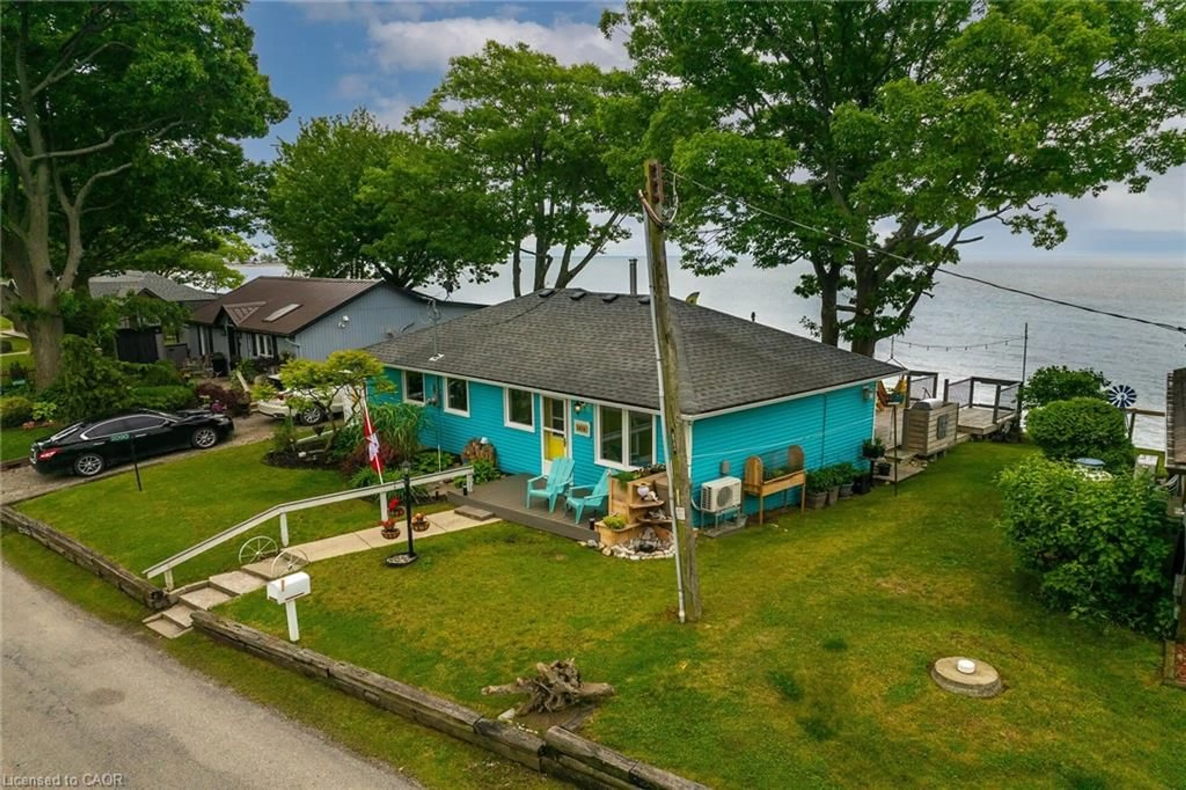 A pic from outside/outdoor area/front of a property/back of a property/a pic from drone, water/lake/river/ocean view for 2090 Lakeshore Rd, Dunnville Ontario N1A 2W8