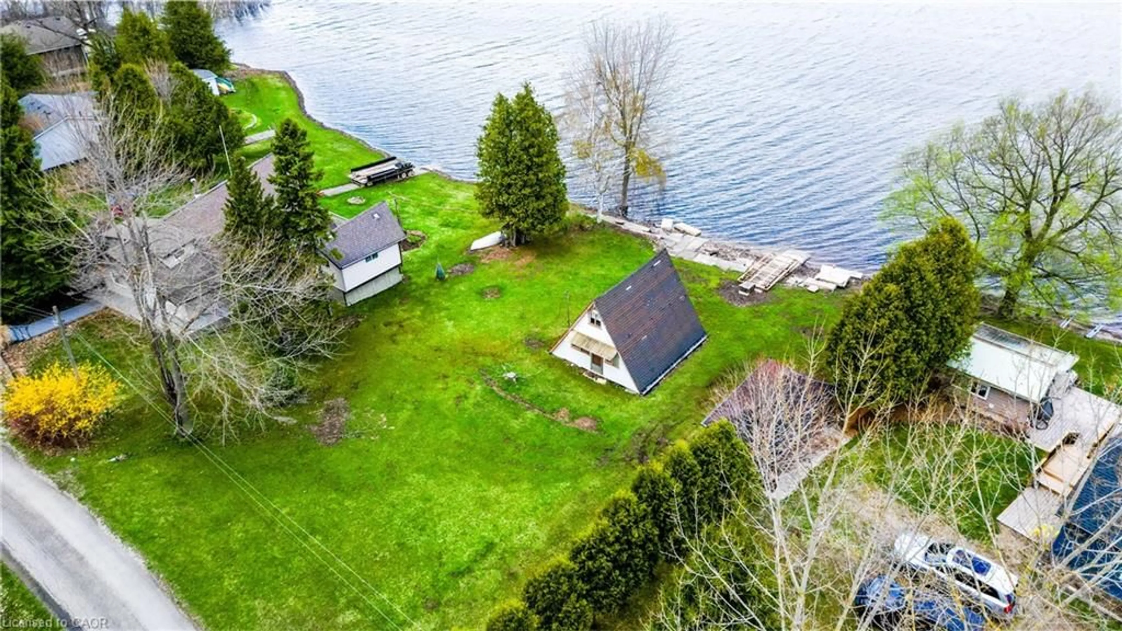 A pic from outside/outdoor area/front of a property/back of a property/a pic from drone, water/lake/river/ocean view for 129 Road 100, Conestogo Lake Ontario N0G 1P0