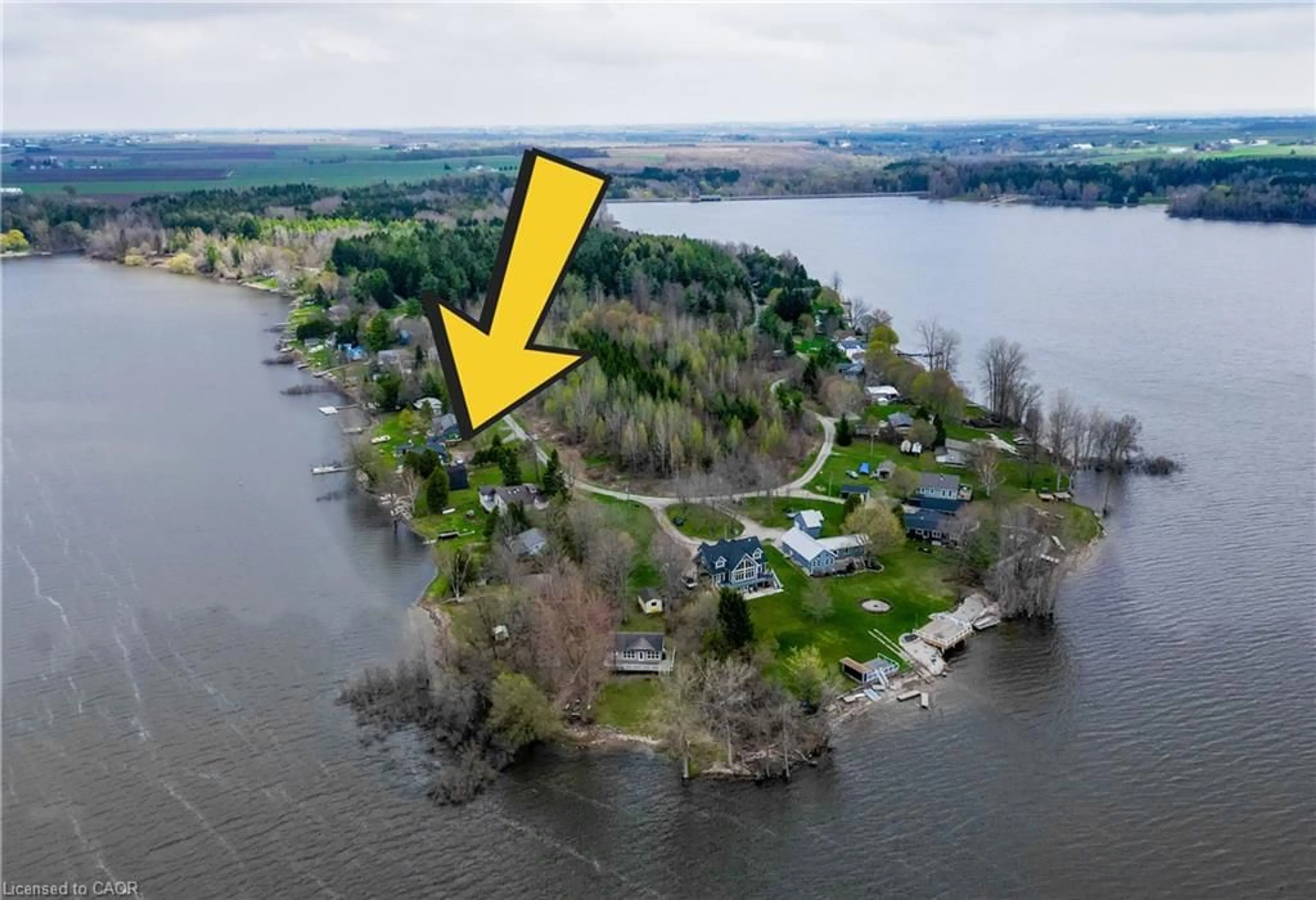 A pic from outside/outdoor area/front of a property/back of a property/a pic from drone, water/lake/river/ocean view for 129 Road 100, Conestogo Lake Ontario N0G 1P0