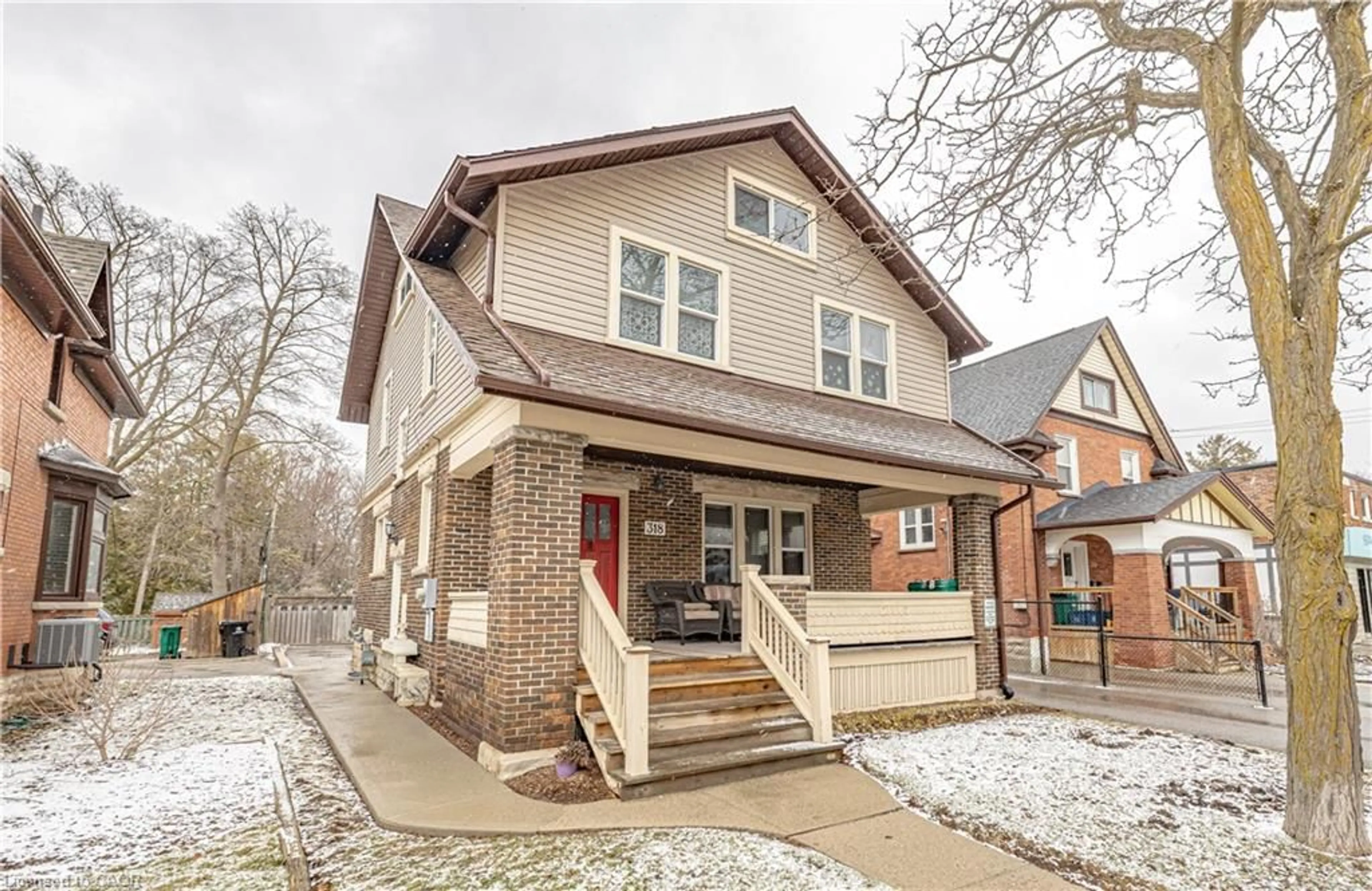 Home with brick exterior material, street for 318 Frederick St, Kitchener Ontario N2H 2N7