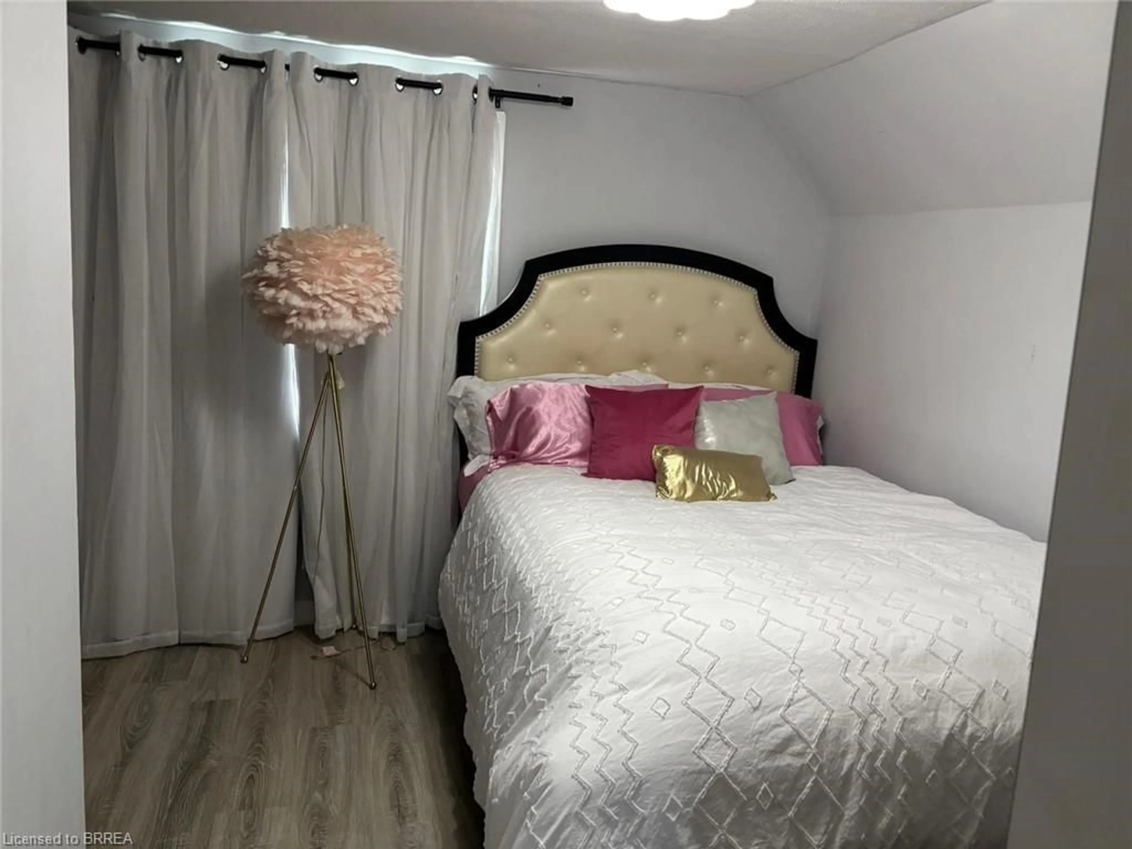 Bedroom with bed, wood/laminate floor for 75 Tollgate Rd, Brantford Ontario N3R 4Z5