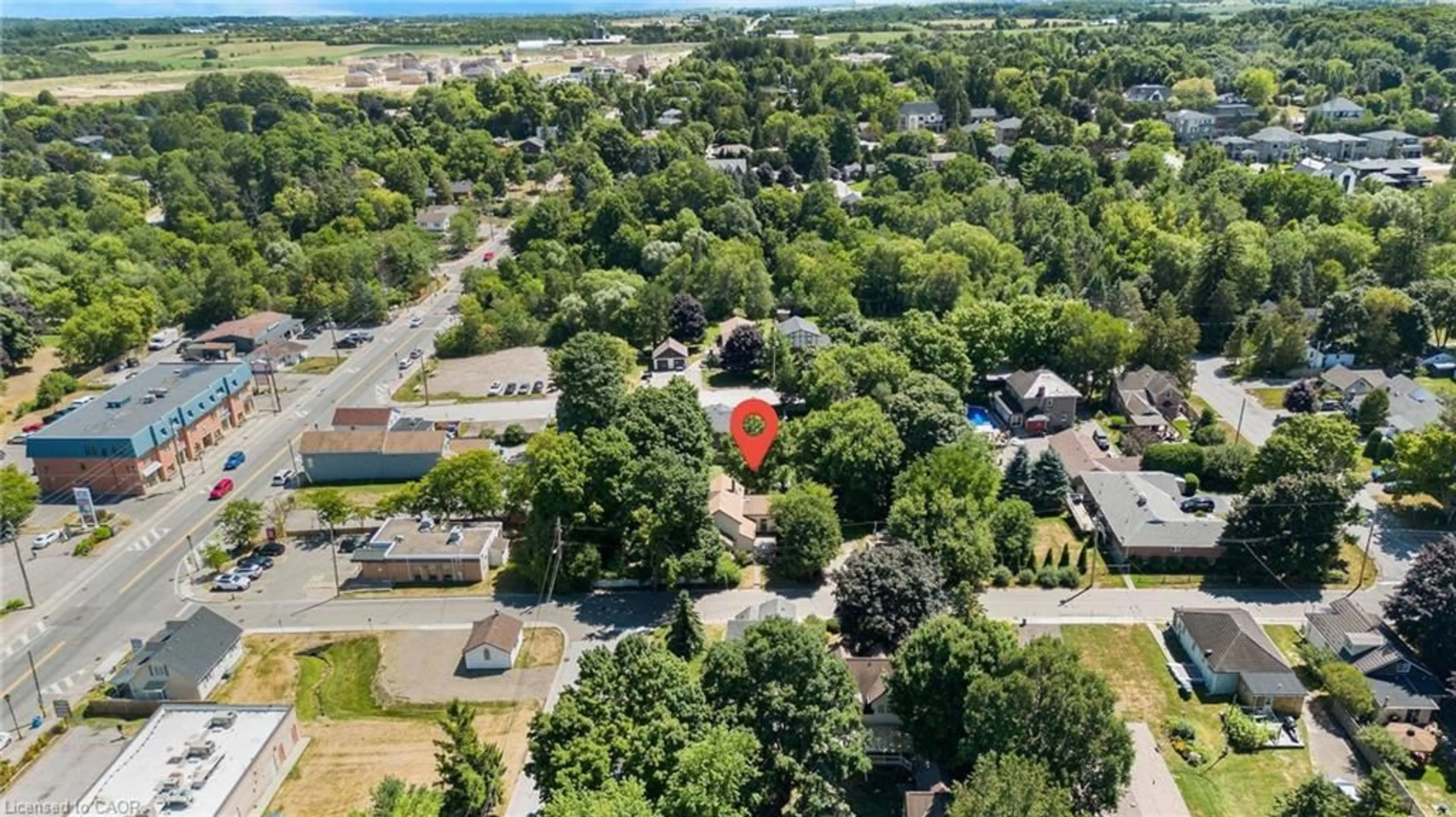 A pic from outside/outdoor area/front of a property/back of a property/a pic from drone, street for 2 Parsons Ave, Caledon East Ontario L7C 1G1