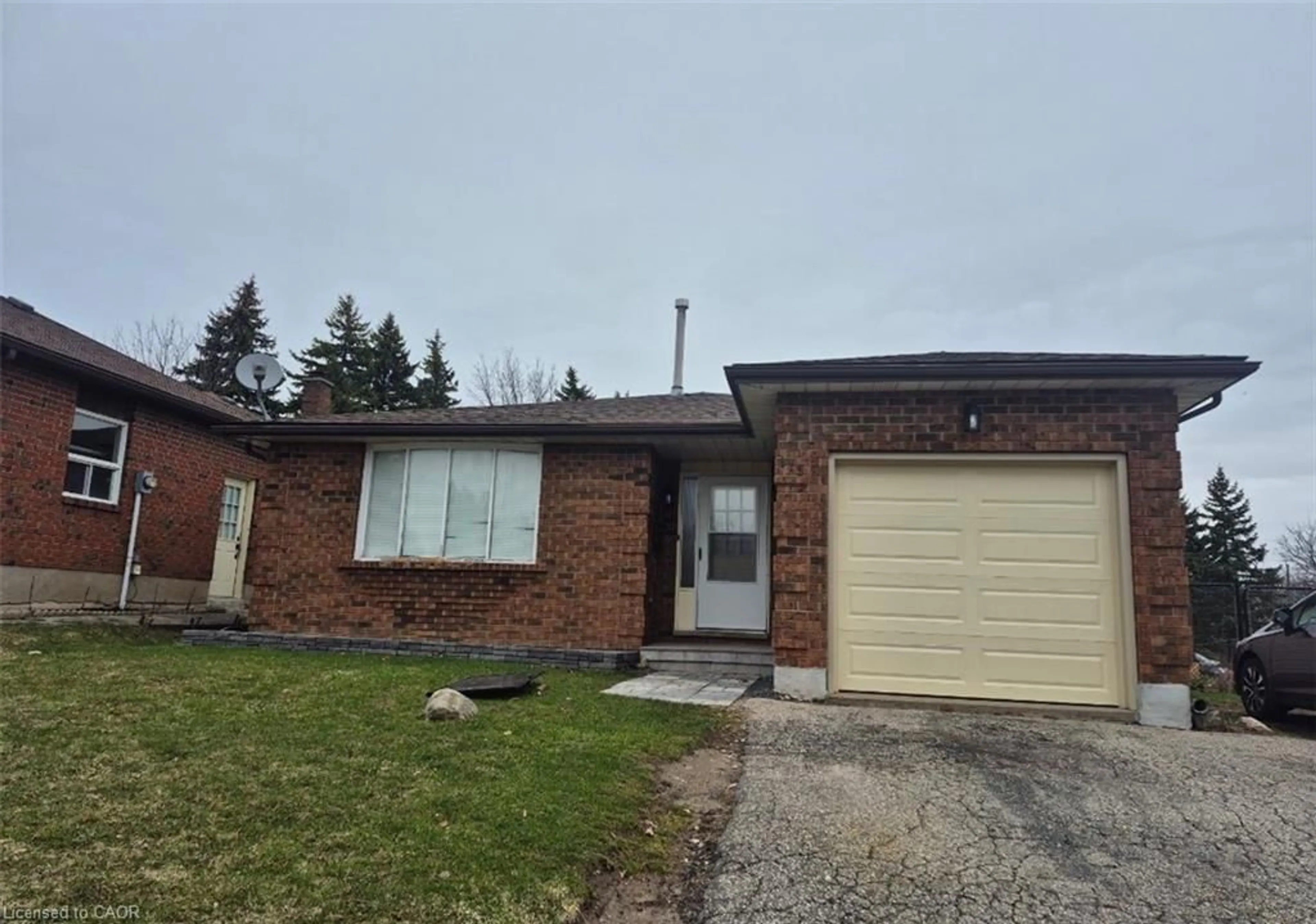 Home with brick exterior material, street for 115 Westvale Dr, Waterloo Ontario N2T 1K1