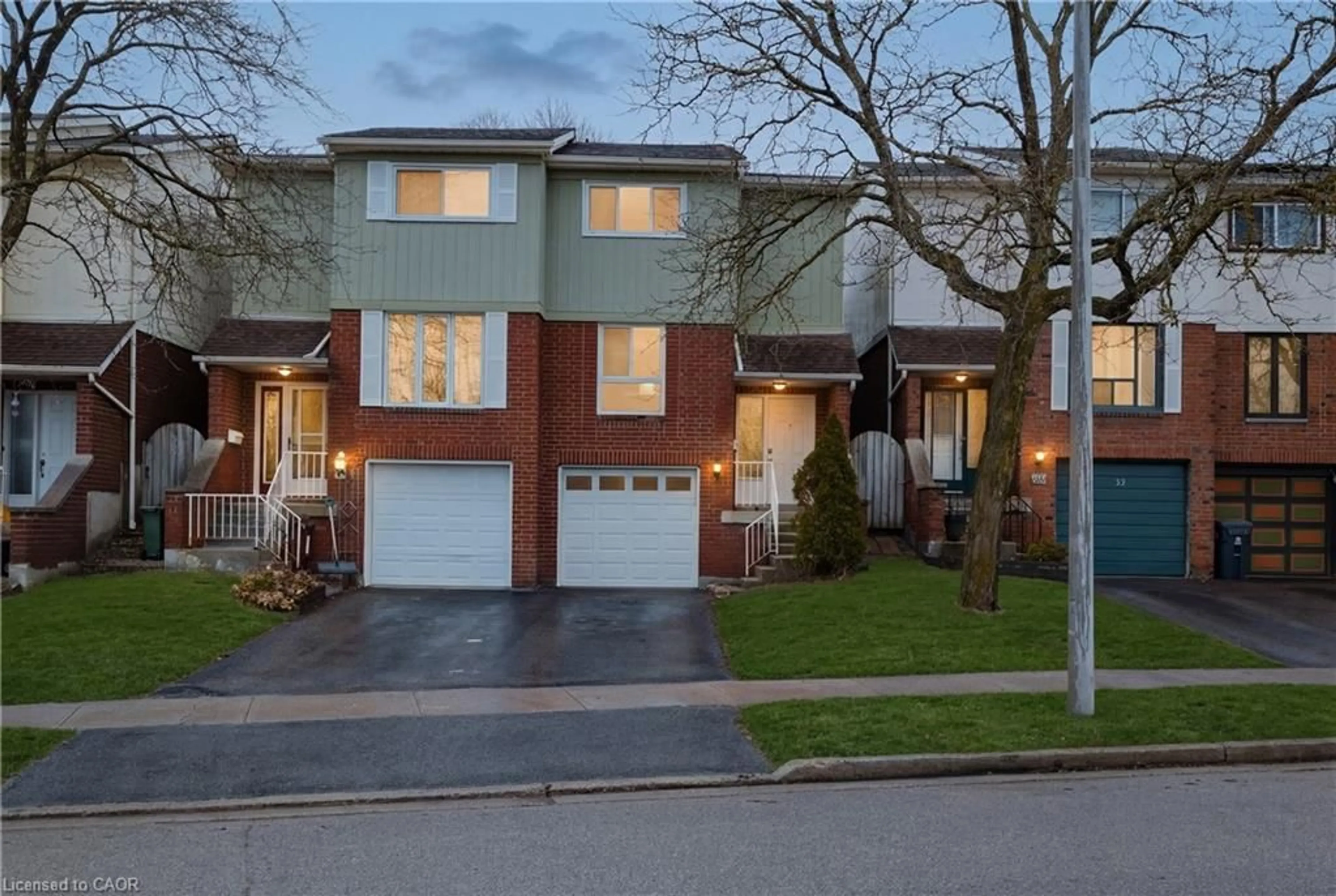 Home with brick exterior material, street for 55 Dovercliffe Road Rd, Guelph Ontario N1G 2Z6