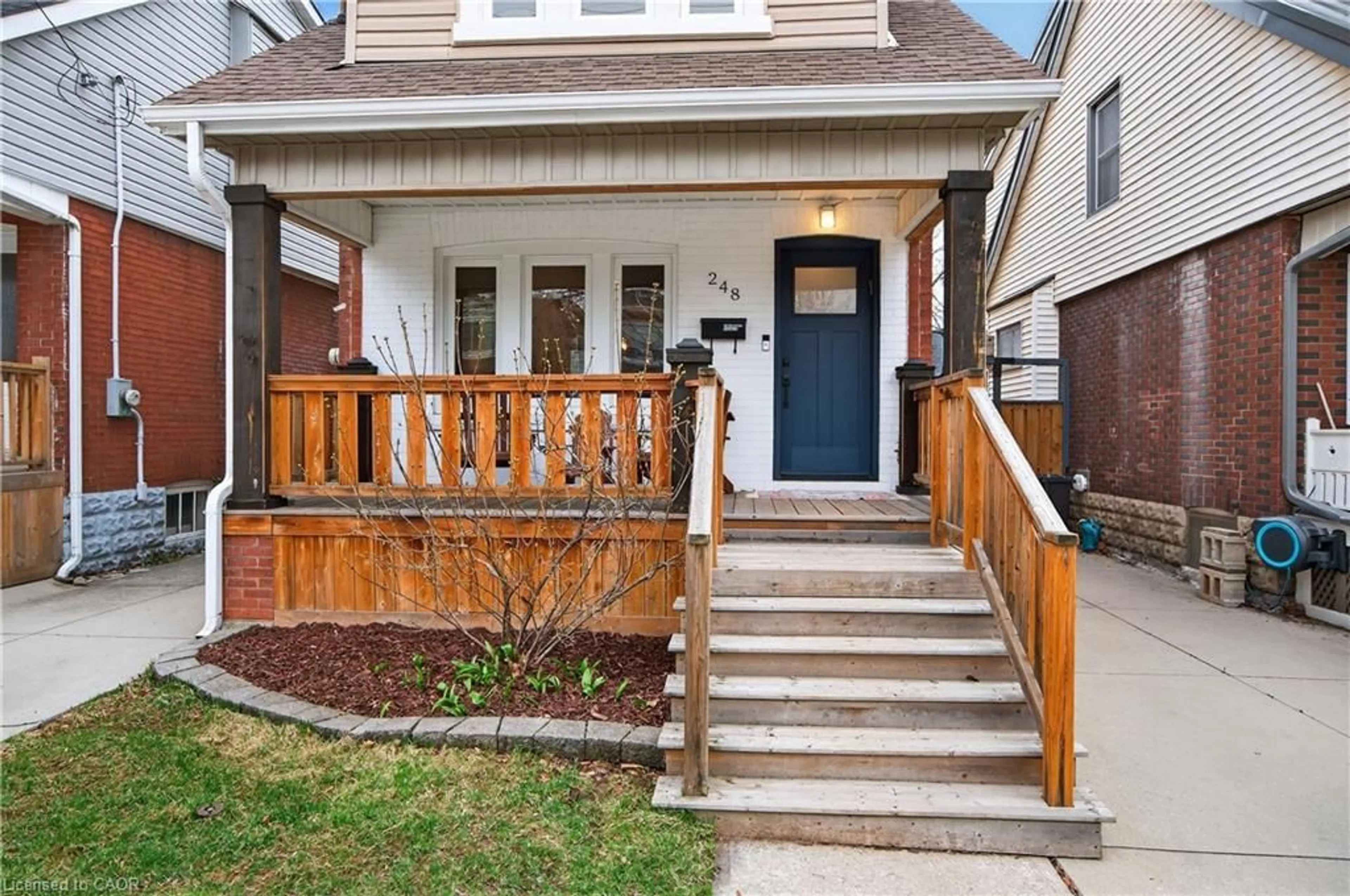 Home with brick exterior material, street for 248 London St, Hamilton Ontario L8K 2H2