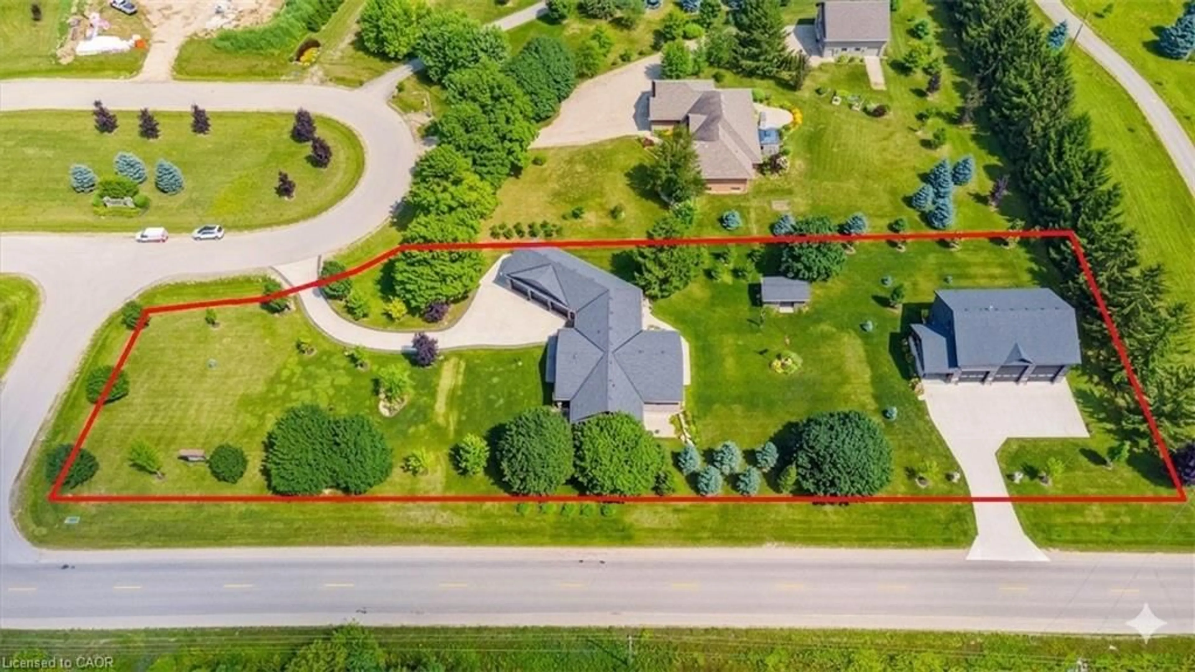 A pic from outside/outdoor area/front of a property/back of a property/a pic from drone, street for 100 Harris Cres, Mount Forest Ontario N0G 2L0