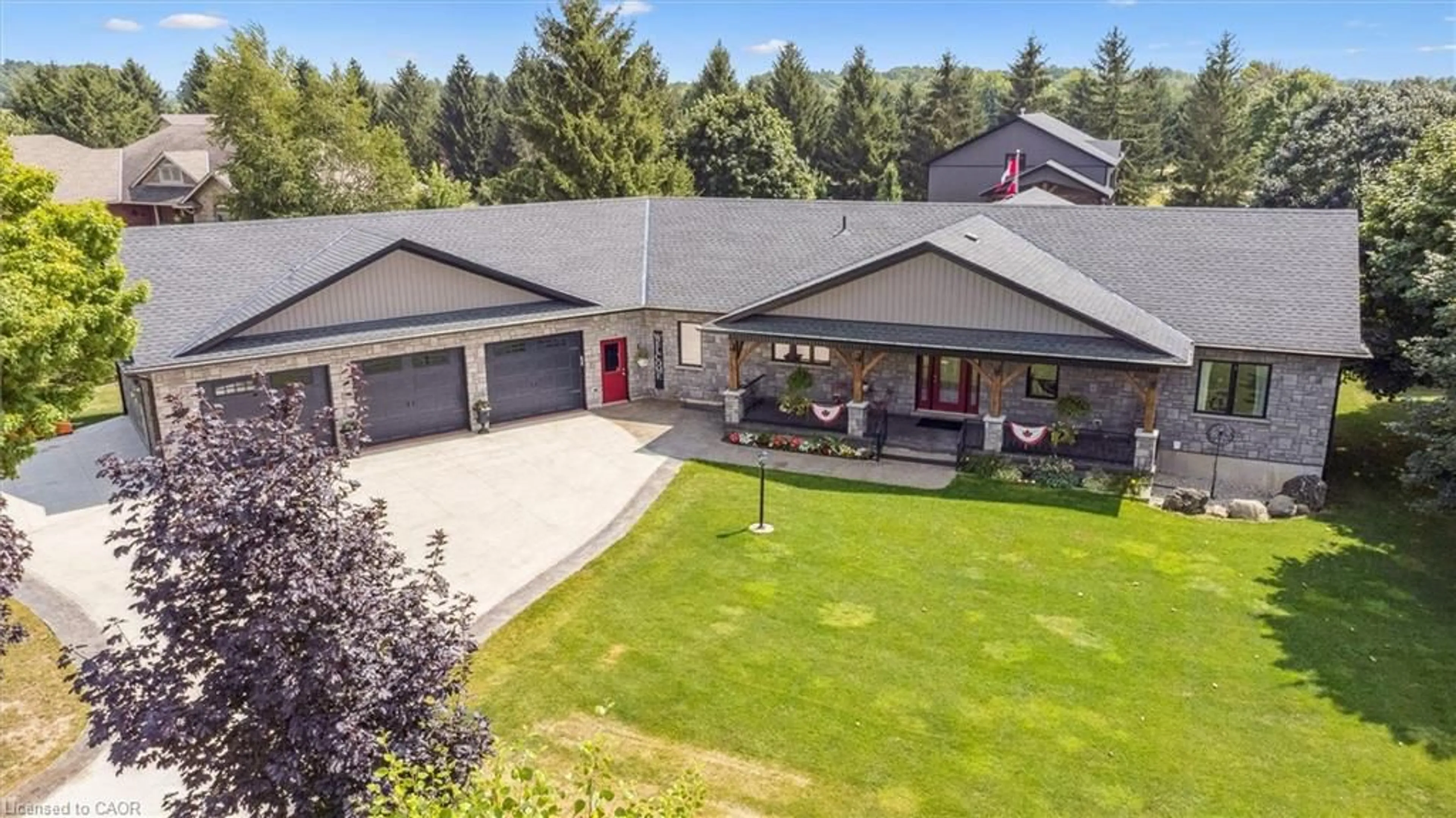 A pic from outside/outdoor area/front of a property/back of a property/a pic from drone, mountain view for 100 Harris Cres, Mount Forest Ontario N0G 2L0