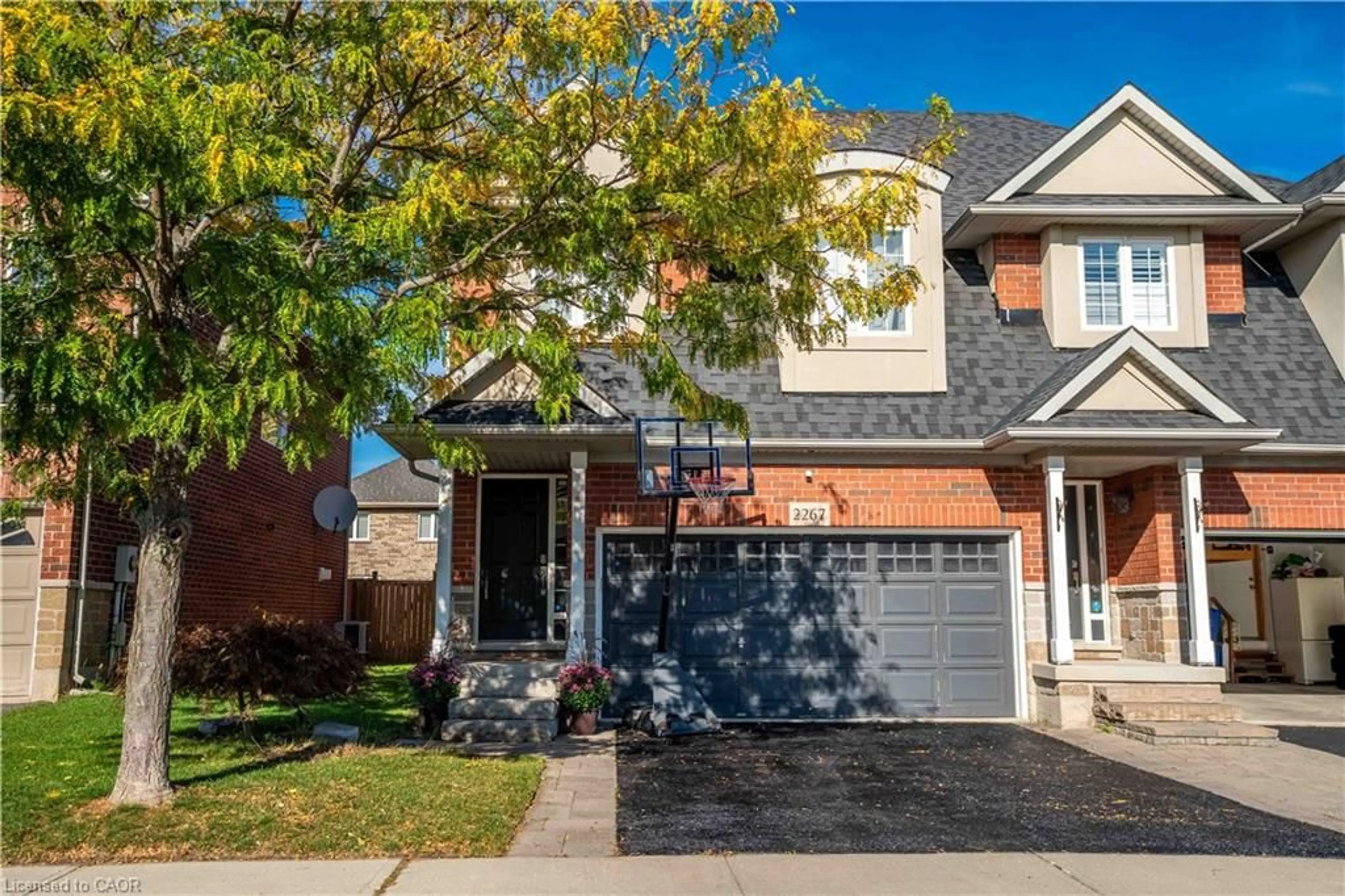 Home with brick exterior material, street for 2267 Whistling Springs Cres, Oakville Ontario L6M 5G5