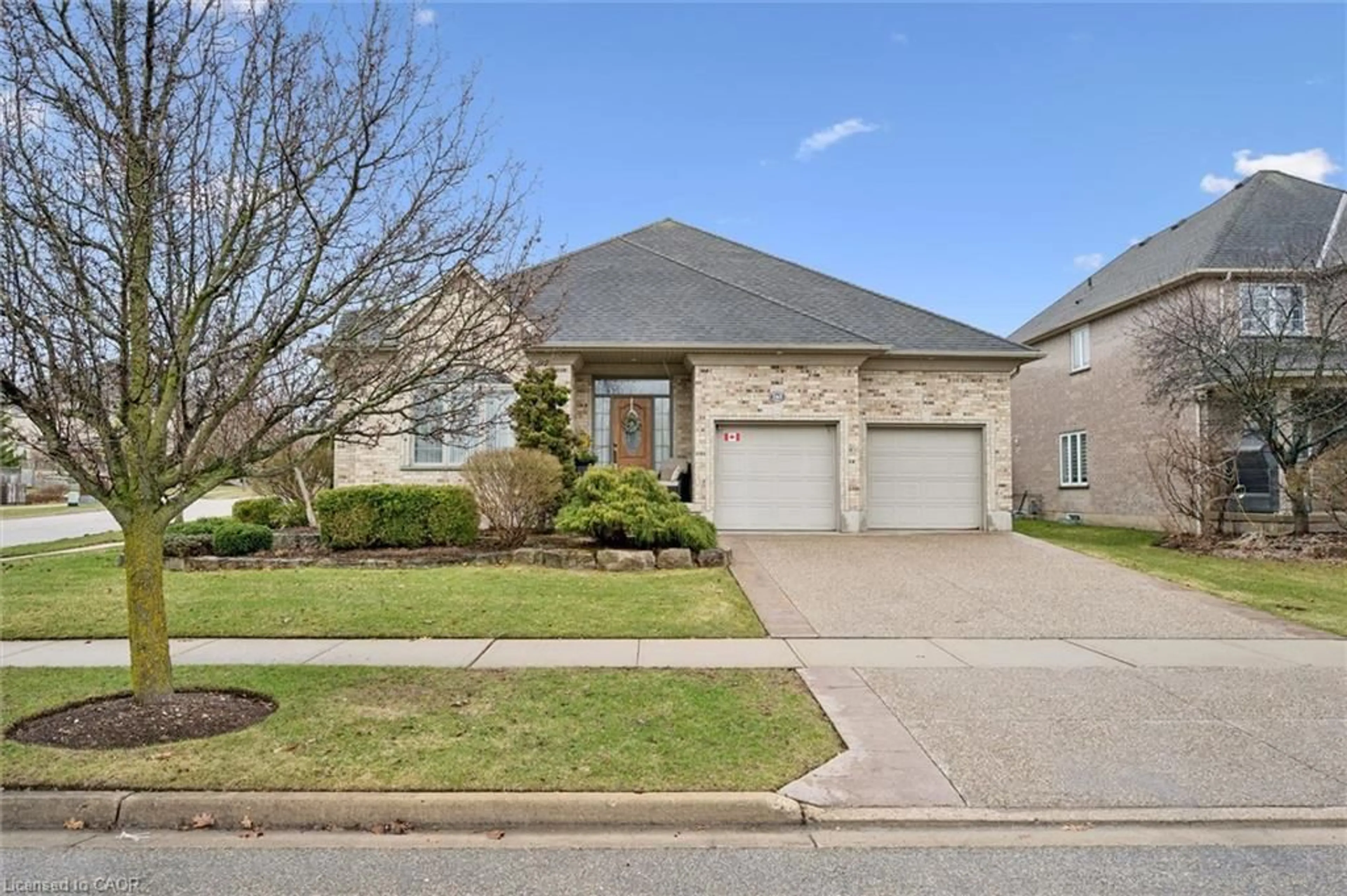 Home with brick exterior material, street for 285 Deer Ridge Dr, Kitchener Ontario N2P 2K6