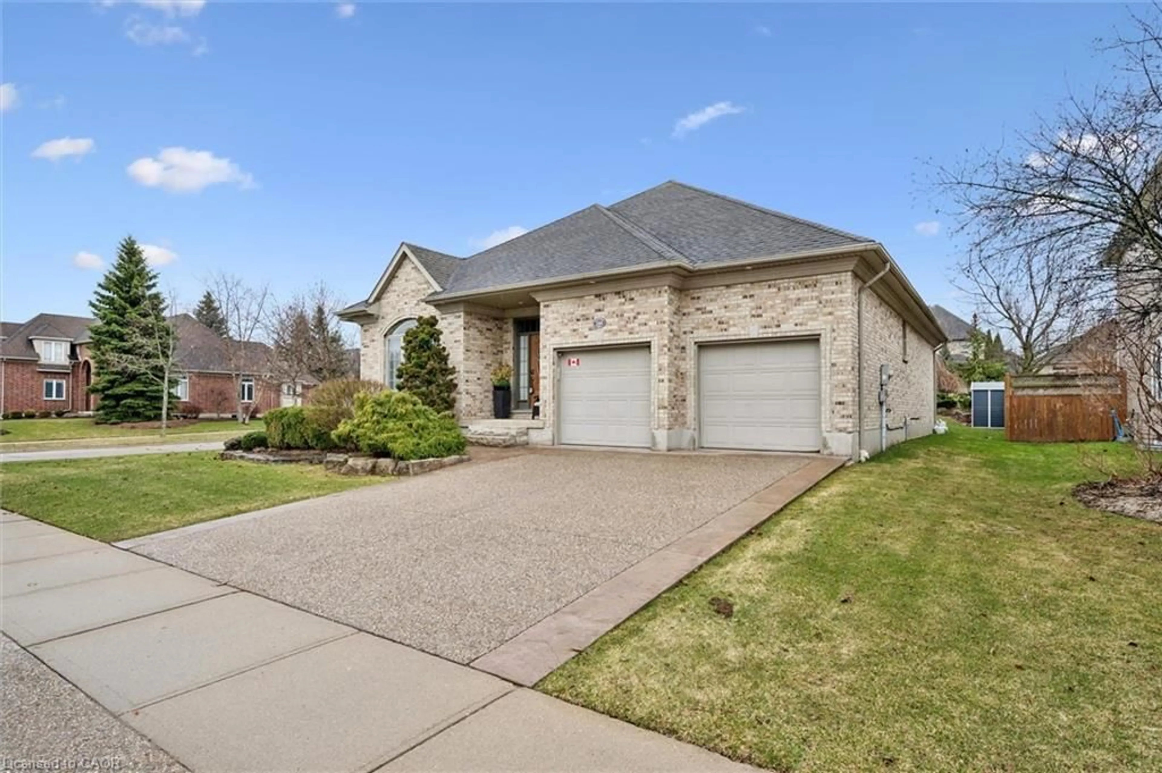 Home with brick exterior material, street for 285 Deer Ridge Dr, Kitchener Ontario N2P 2K6