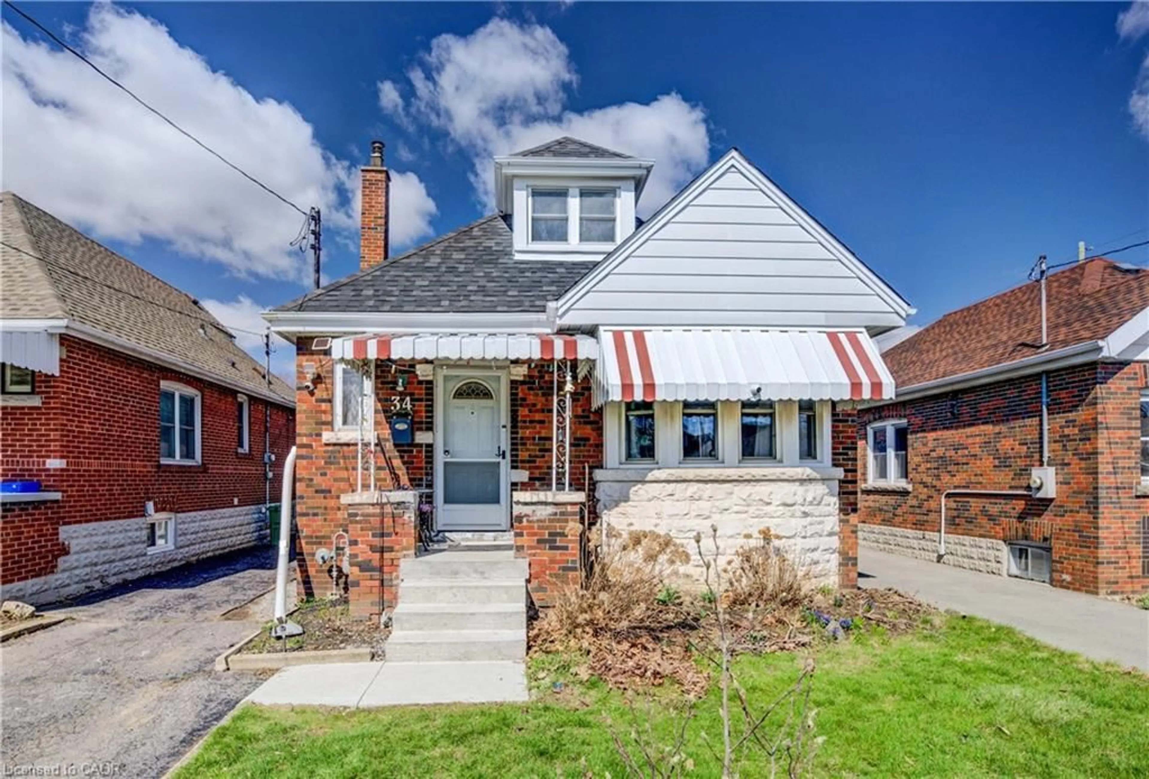 Home with brick exterior material, street for 34 Barons Ave, Hamilton Ontario L8K 2Y2