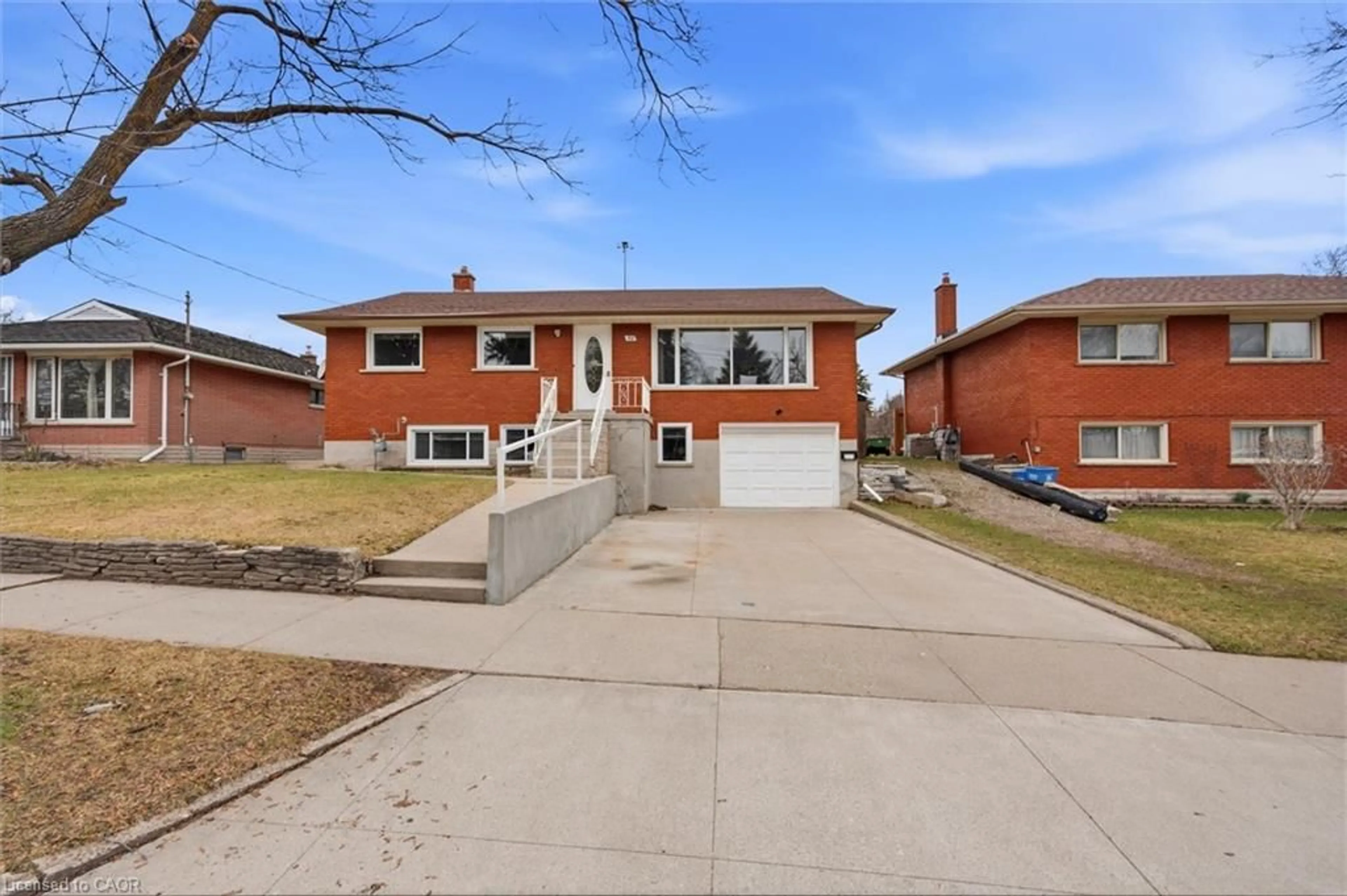 Home with brick exterior material, street for 52 Boniface Ave, Kitchener Ontario N2C 1L9