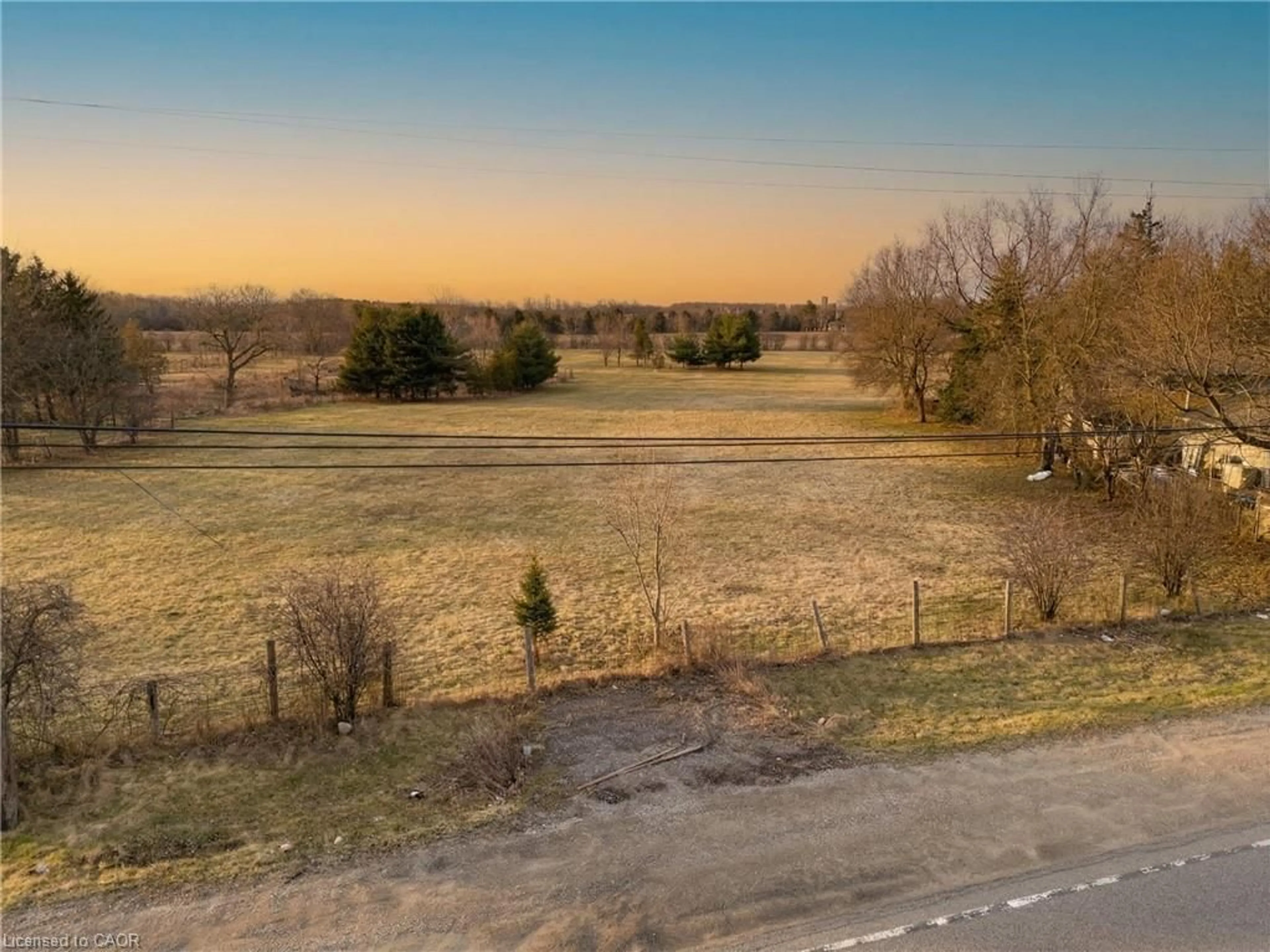 A pic from outside/outdoor area/front of a property/back of a property/a pic from drone, forest/trees view for 8011 Highway 7, Guelph/Eramosa Ontario N1H 6H8