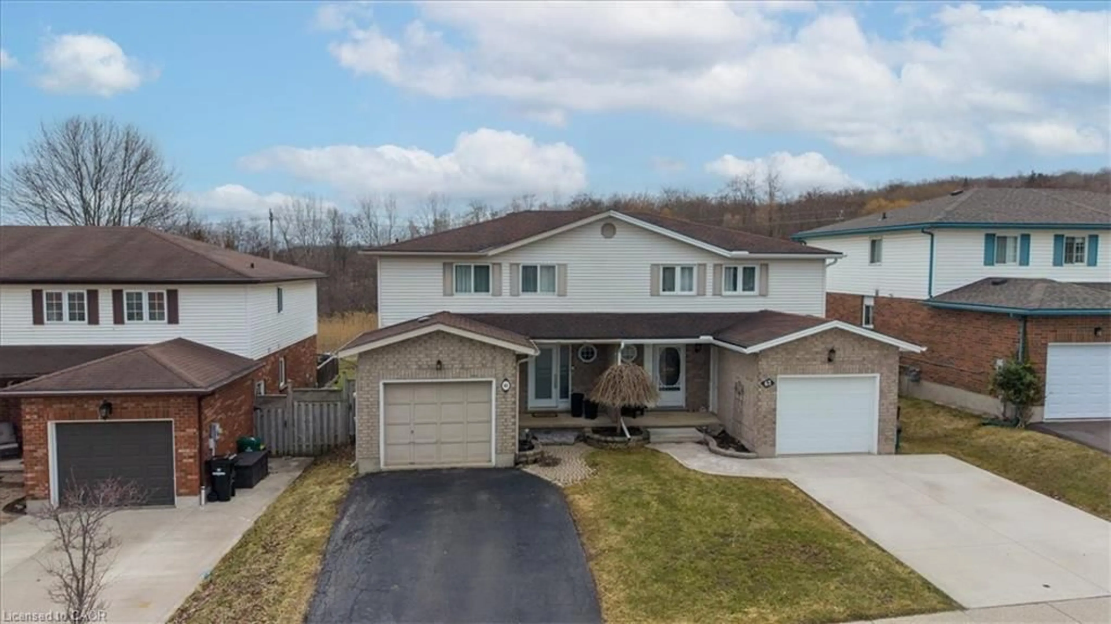 A pic from outside/outdoor area/front of a property/back of a property/a pic from drone, street for 65 Misty St, Kitchener Ontario N2B 3V6