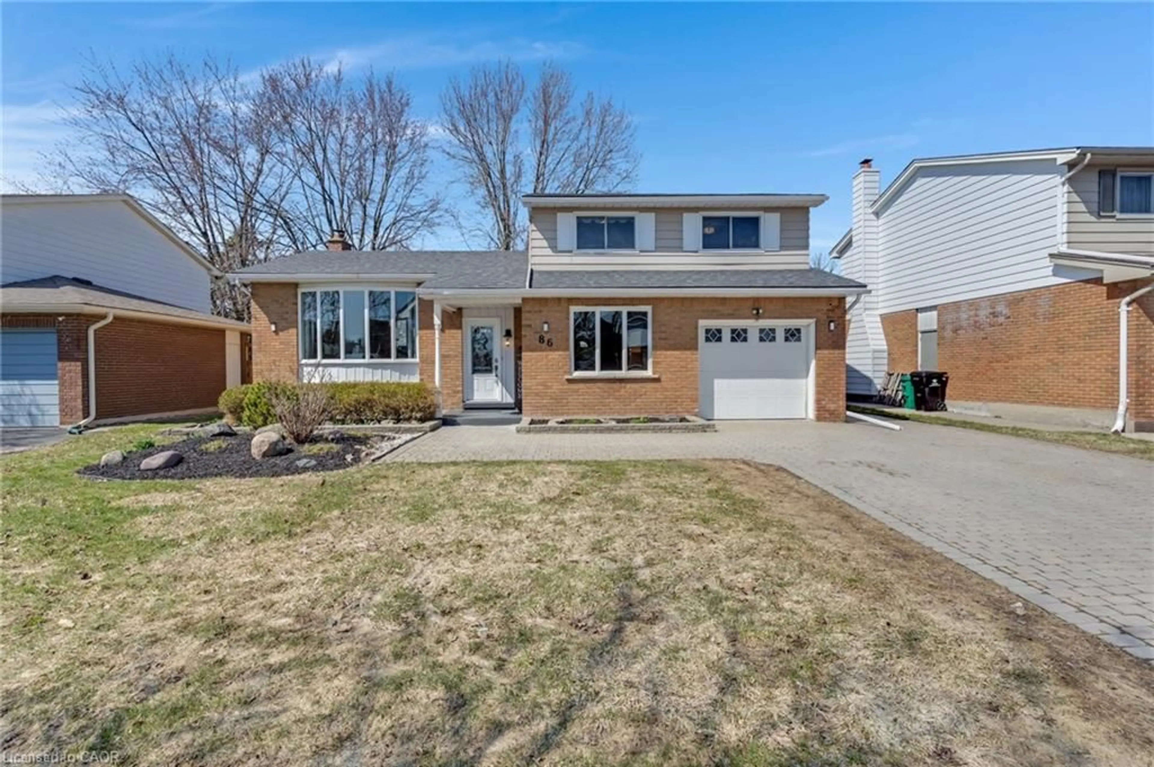 Home with brick exterior material, street for 86 Mcgarry Dr, Kitchener Ontario N2N 1A4